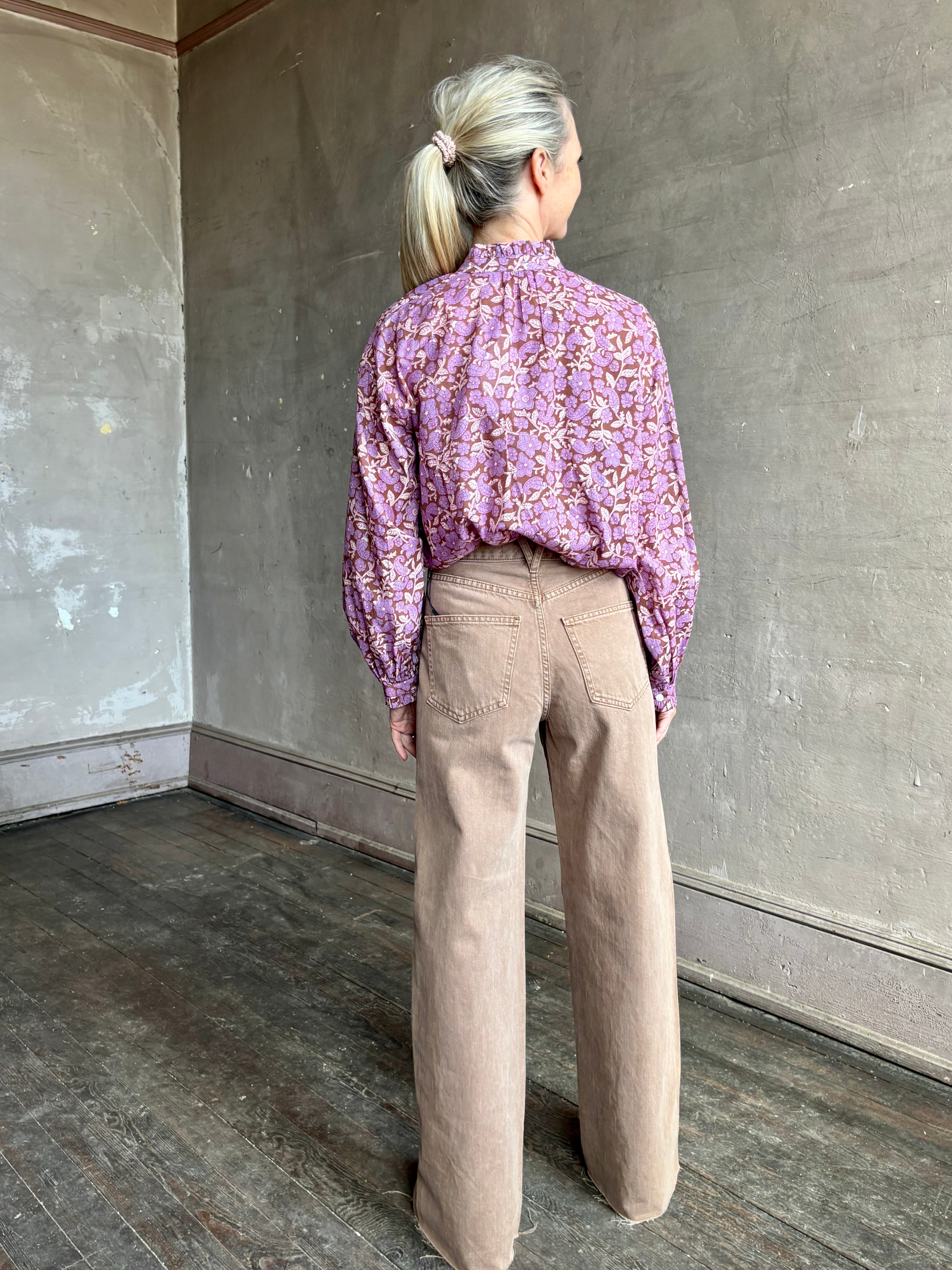 Image of woman wearing Alix of Bohemia Poet Twilight floral blouse with mandarin collar long sleeves and delicate ruffle accents 