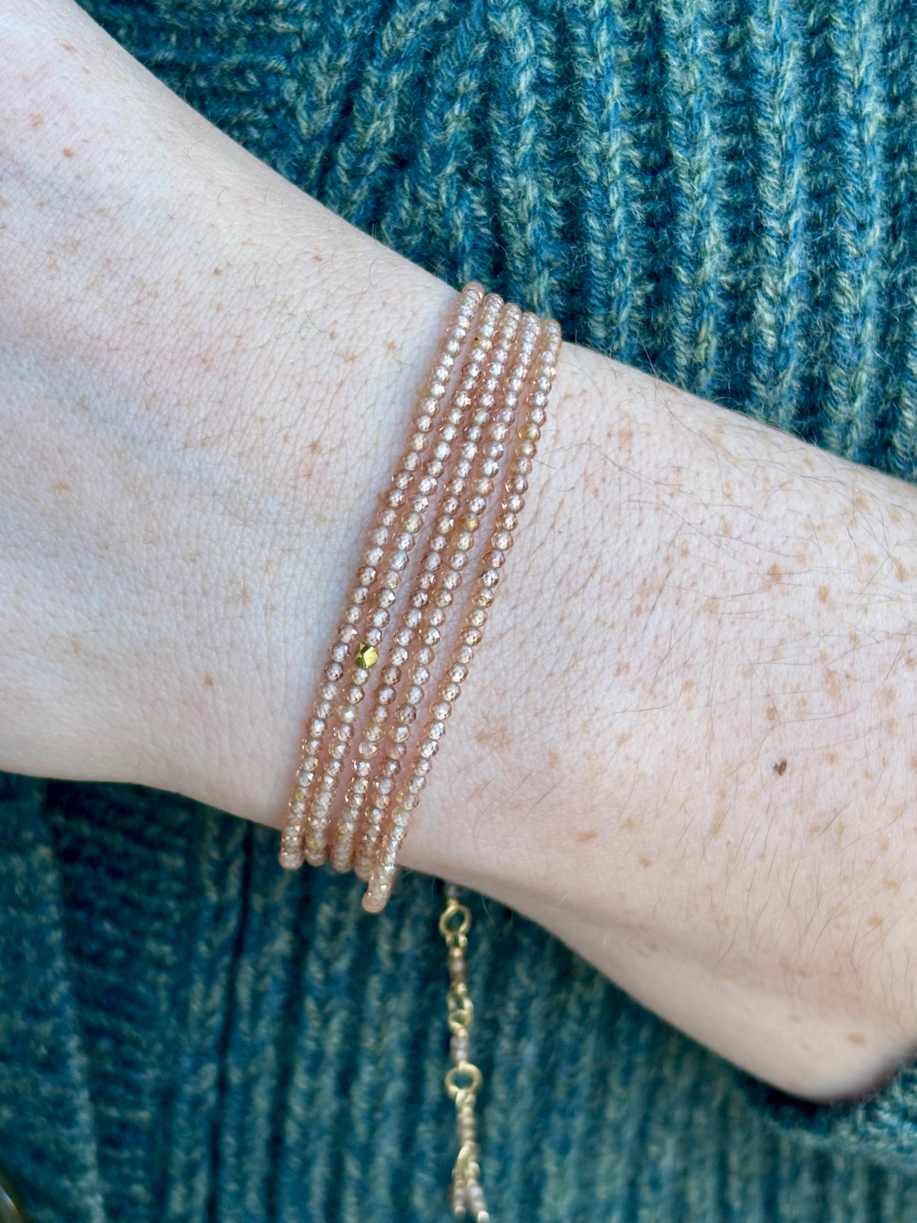 Brown zircon bracelet by fine jewelry artist Anne Sportun that can be worn as a bracelet or necklace with 18k yellow gold