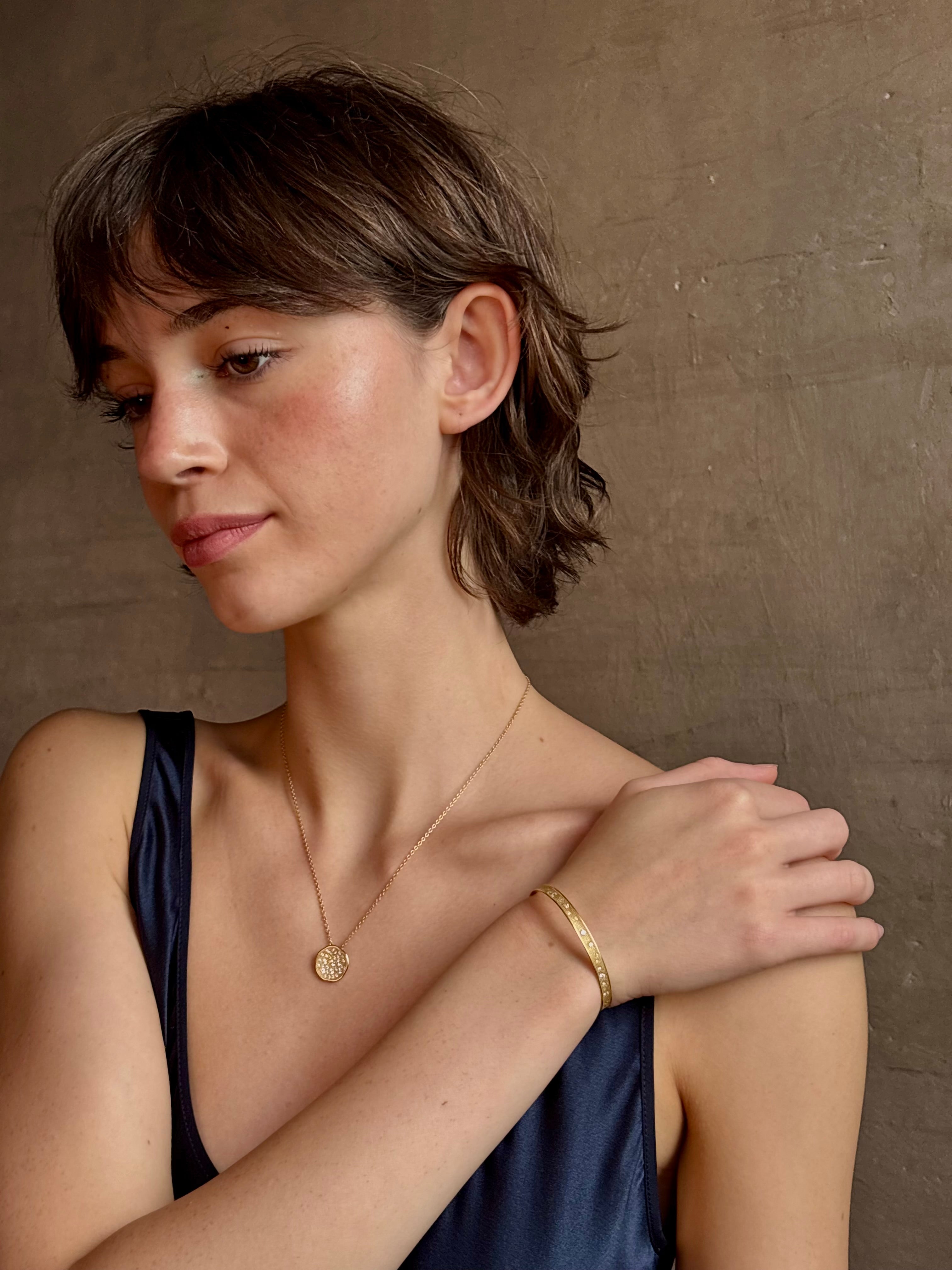 Gold Stardust circular 18k yellow gold Pendant Necklace by fine jewelry artist Anne Sportun with 29 round brilliant-cut diamonds 