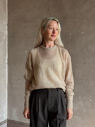 Apiece Apart's Cashmere/Silk Sweater in Beige  tissue-weight knit with a semi-transparent,  conscious luxury layering
