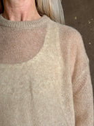 Apiece Apart's Cashmere/Silk Sweater in Beige  tissue-weight knit with a semi-transparent,  conscious luxury layering