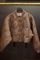 Agolde Iona quilted jacket in brown with circular stitch and  gathered elastic sleeves