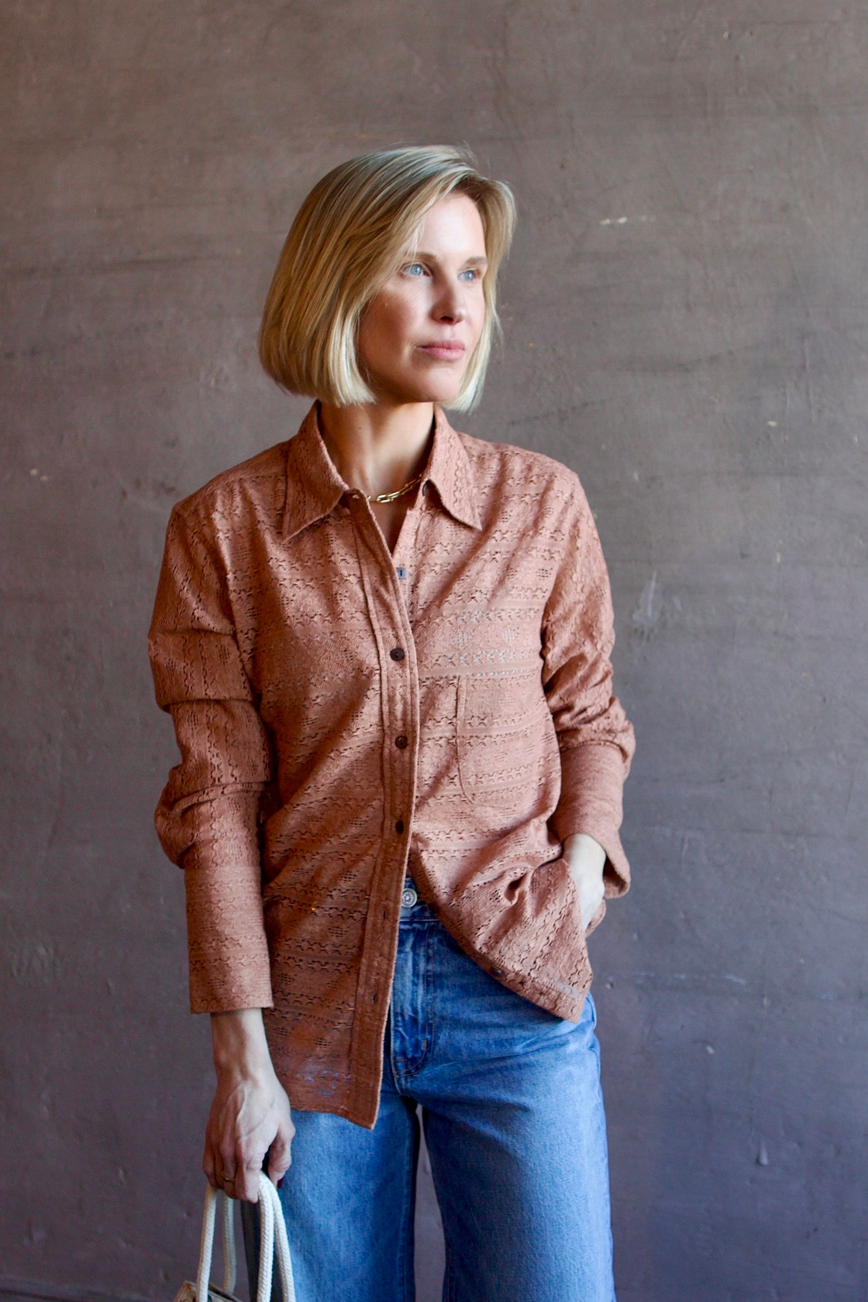 Image of woman wearing the alix of bohemia ondine mocha lace shirt showcasing artisanal sophistication through premium cotton construction 
