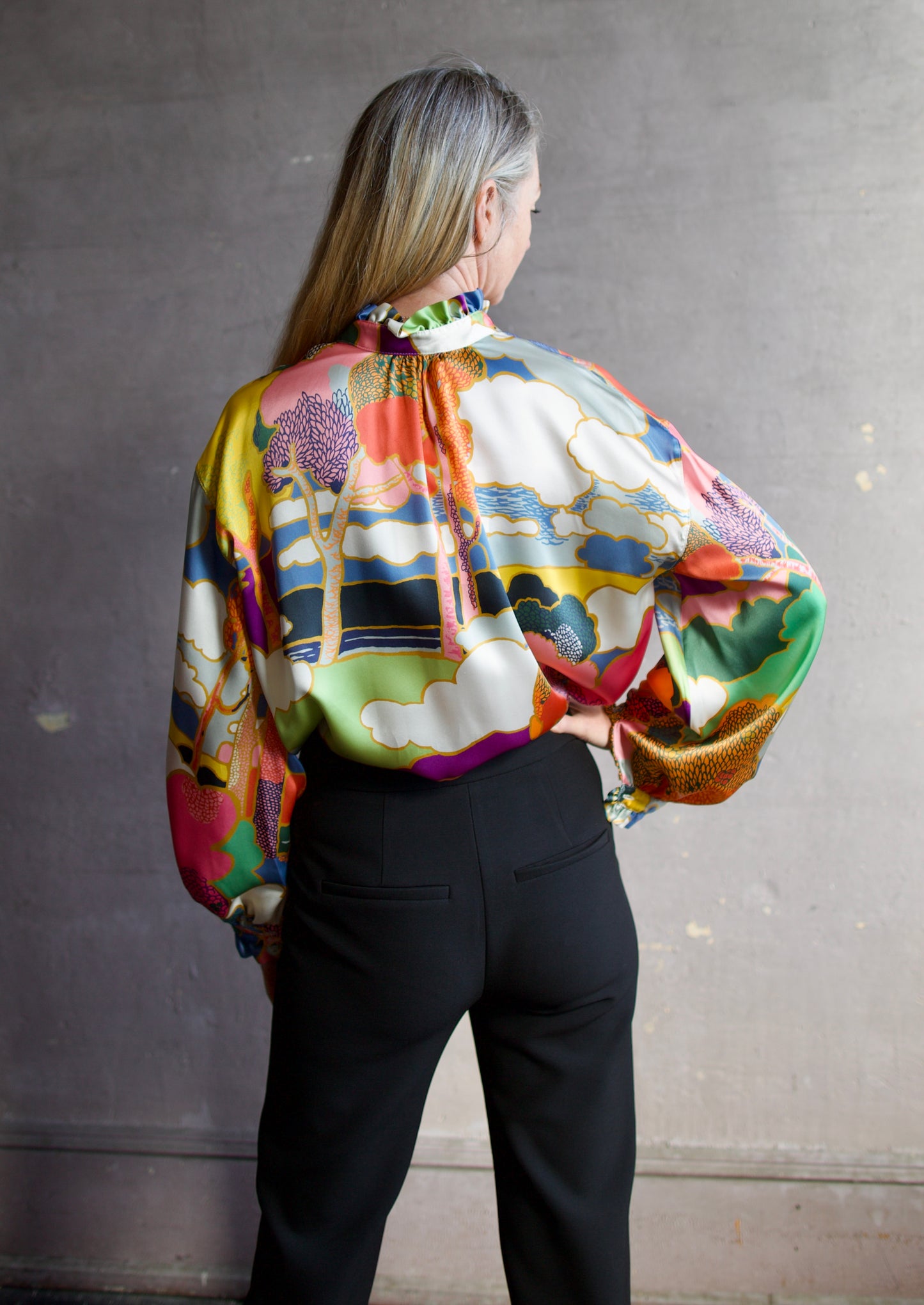 Image featuring the Alix of Bohemia Poet Aurora Blouse rendered from Liberty of London silk charmeuse printed in Italy and featuring an Art Nouveau landscape.