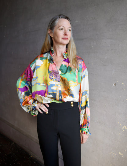 Image featuring the Alix of Bohemia Poet Aurora Blouse rendered from Liberty of London silk charmeuse printed in Italy and featuring an Art Nouveau landscape.