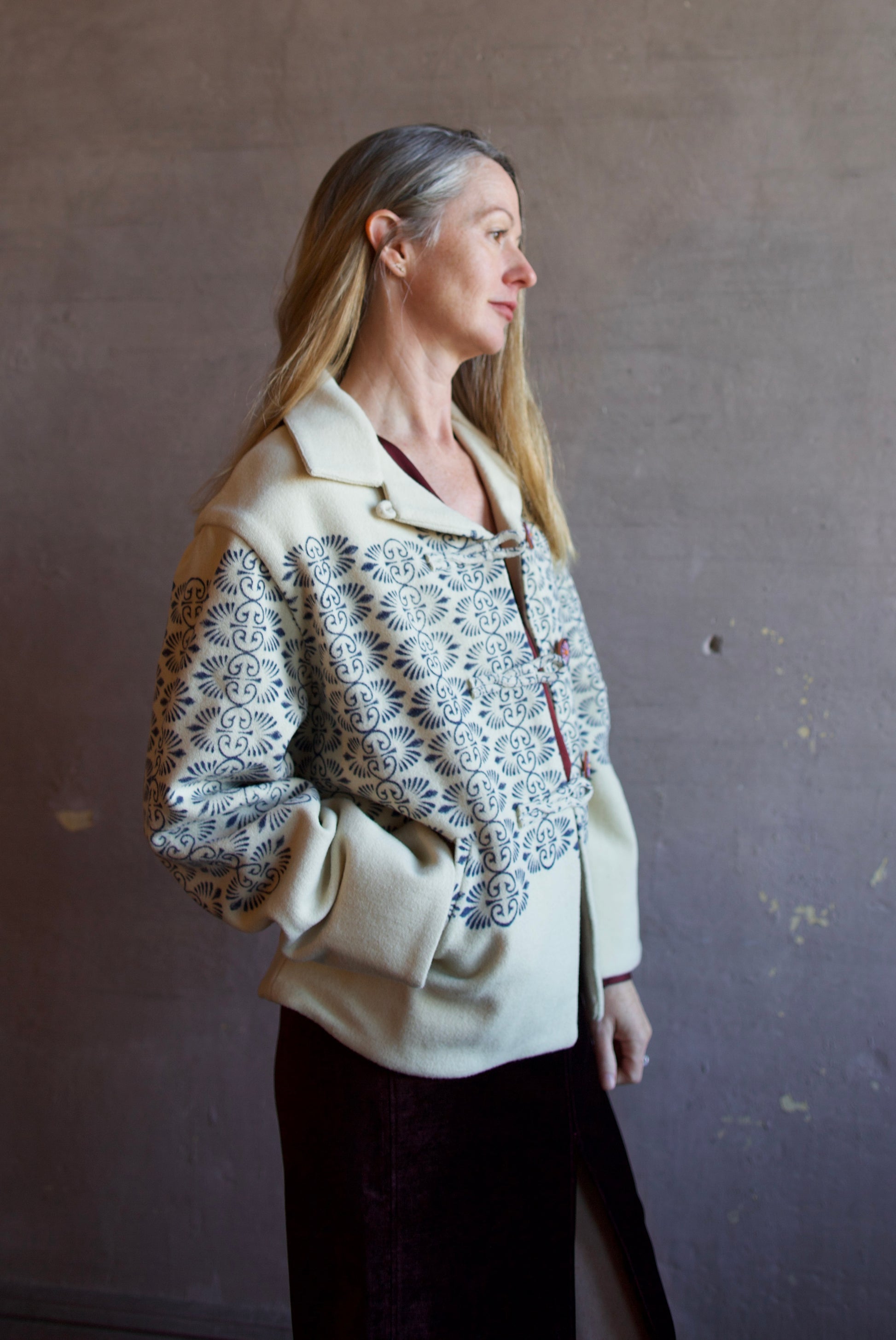 Image featuring a woman wearing Alix of Bohemia Western Lapis Trellis wool Jacket.