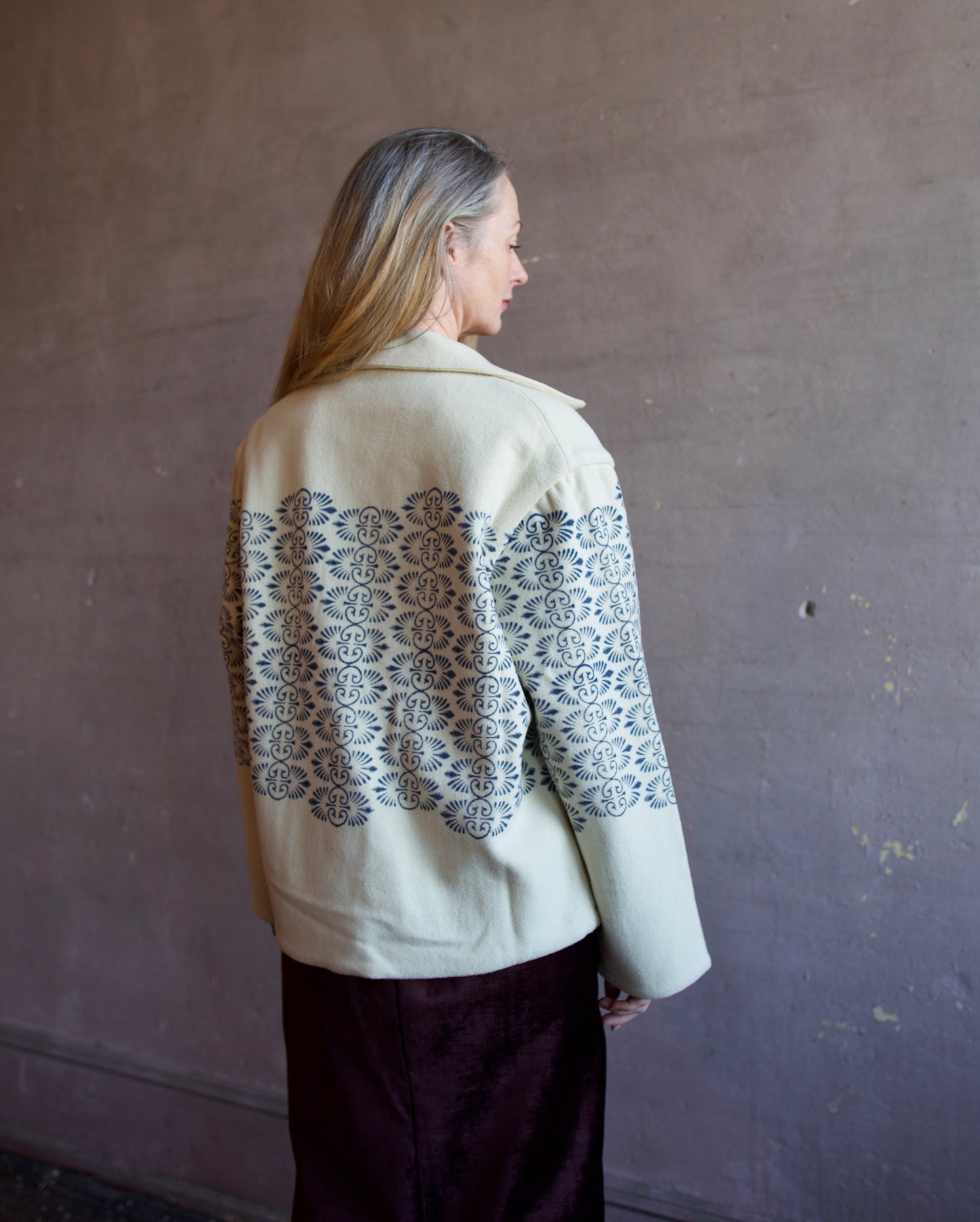 Image featuring a woman wearing Alix of Bohemia Western Lapis Trellis wool Jacket.