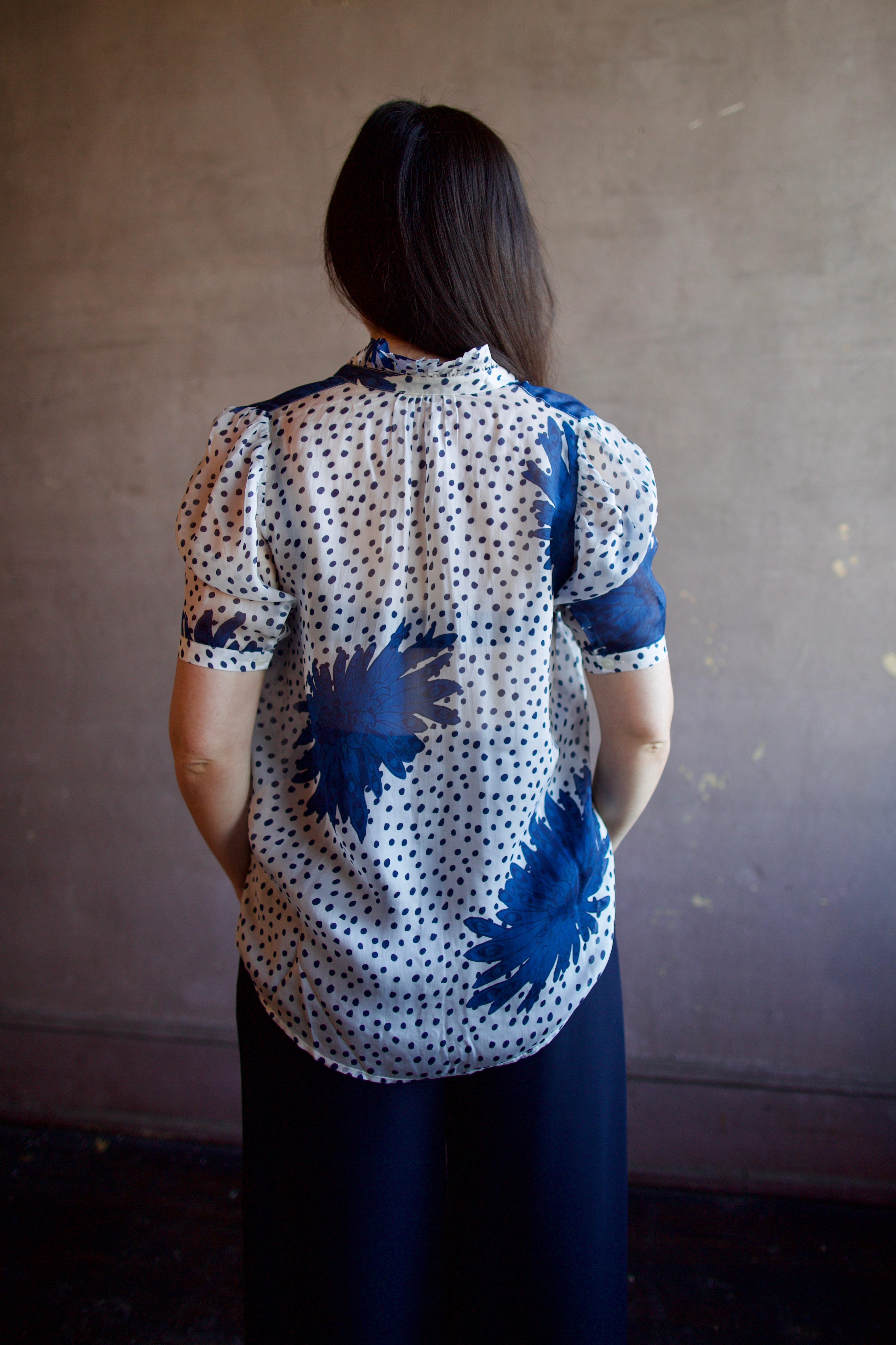 Image of woman wearing luxury alix of bohemia winn indigo dahlia sheer silk shirt featuring an elevated button front with expert handcrafted artistry