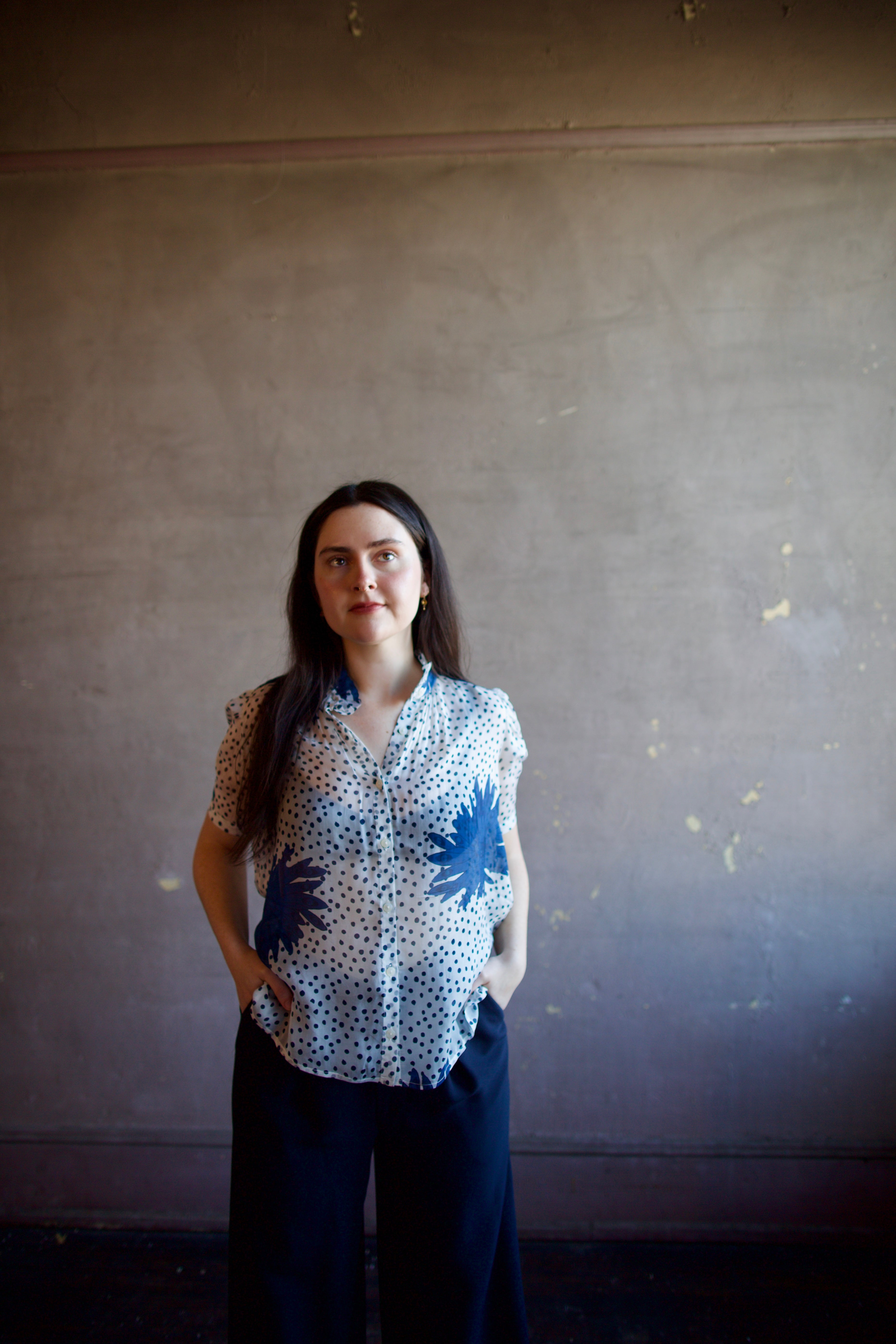 Image of woman wearing luxury alix of bohemia winn indigo dahlia sheer silk shirt featuring an elevated button front with expert handcrafted artistry