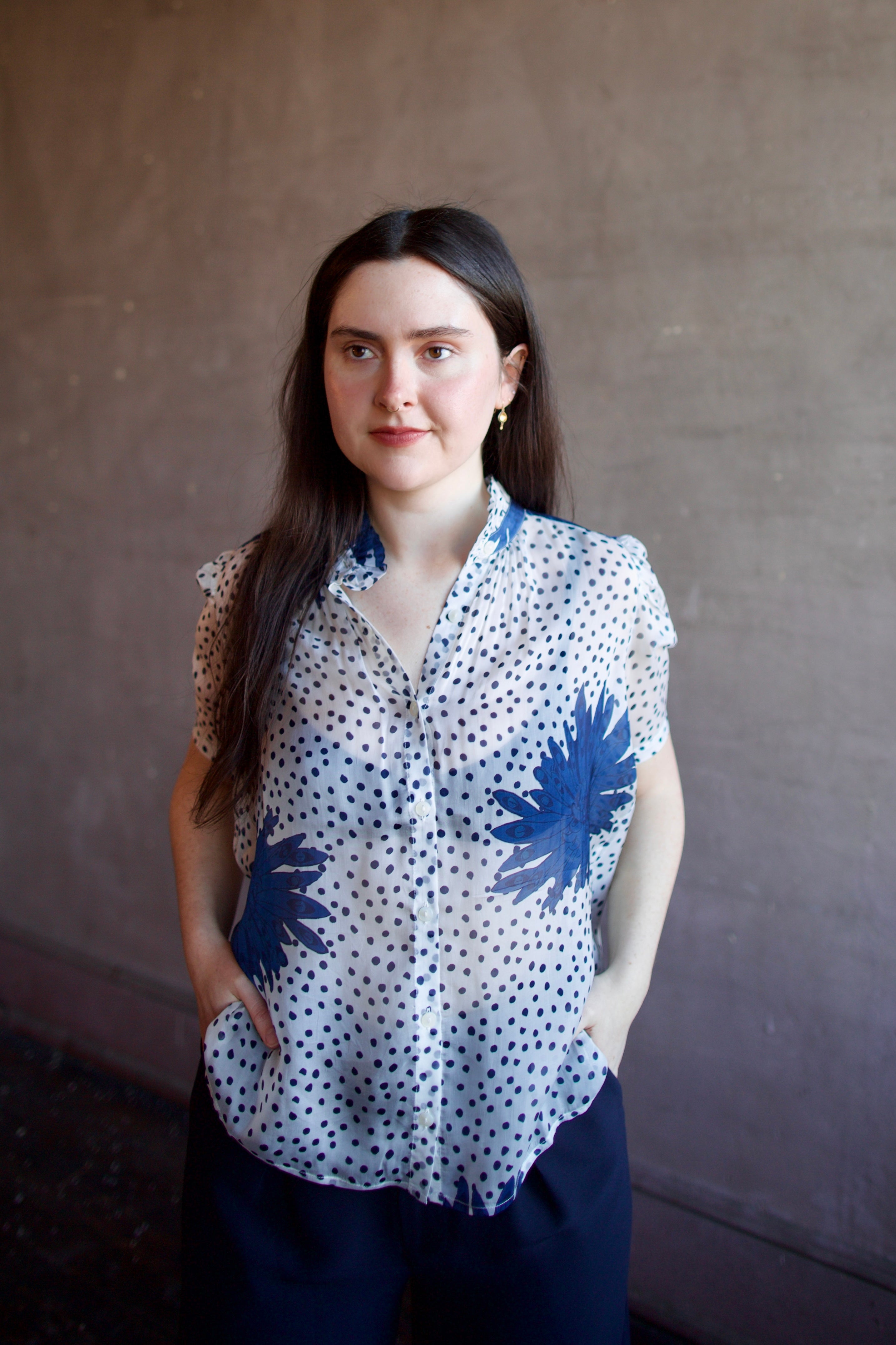 Image of woman wearing luxury alix of bohemia winn indigo dahlia sheer silk shirt featuring an elevated button front with expert handcrafted artistry