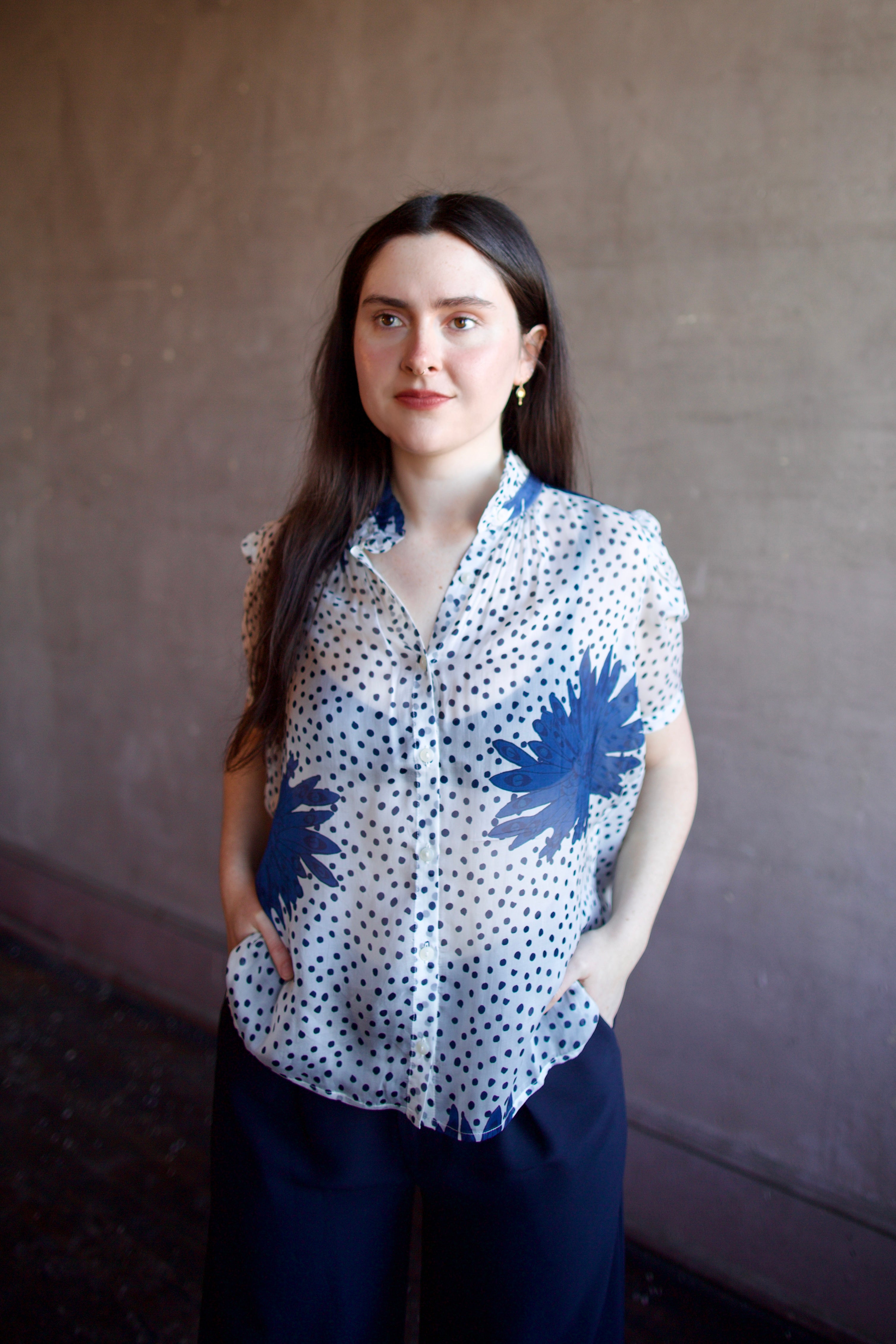 Image of woman wearing luxury alix of bohemia winn indigo dahlia sheer silk shirt featuring an elevated button front with expert handcrafted artistry