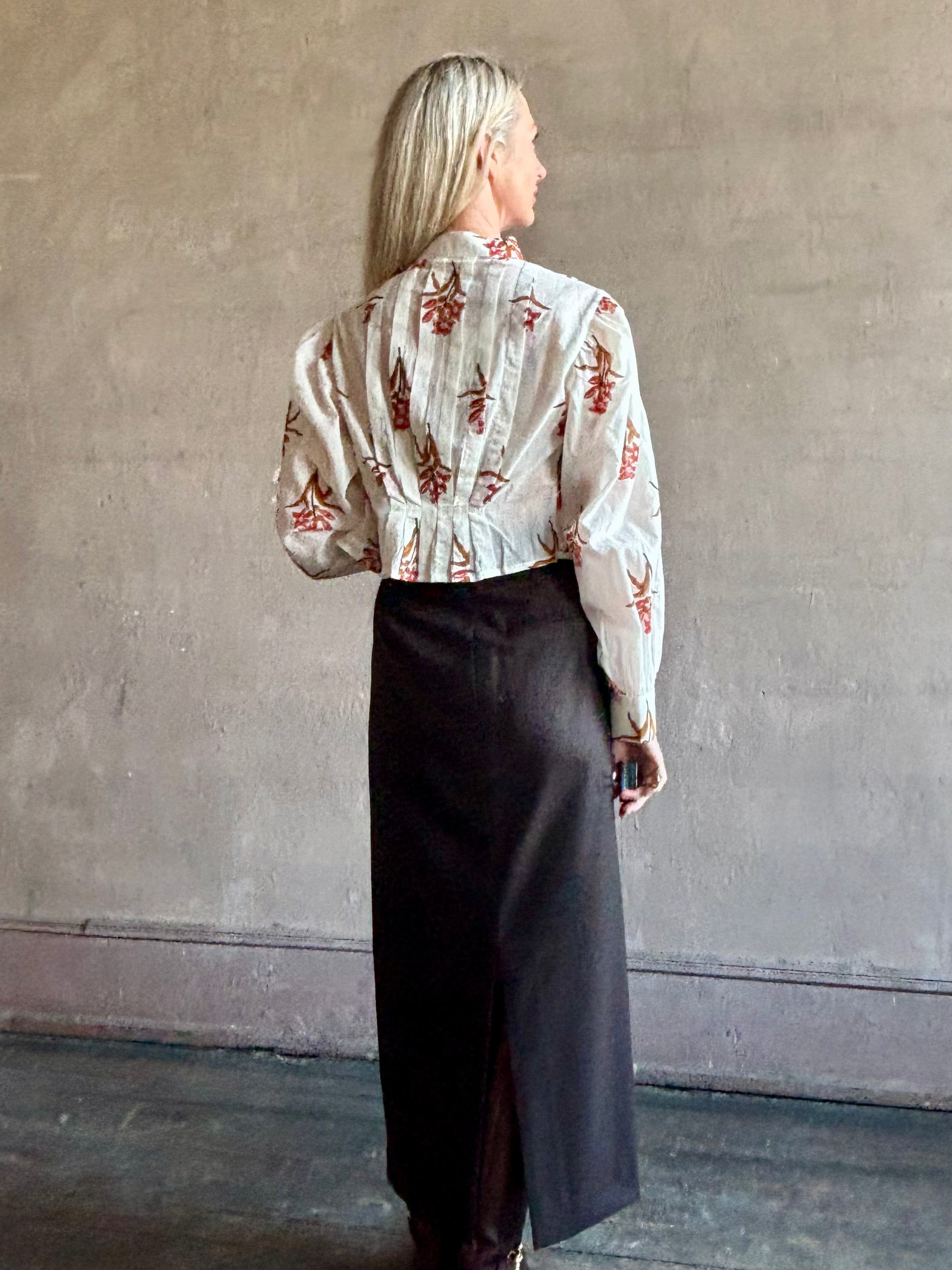 Image of woman Alix of Bohemia Ryland Persimmon Flower Shirt with beautiful pin tucking and gathered waist detail at back