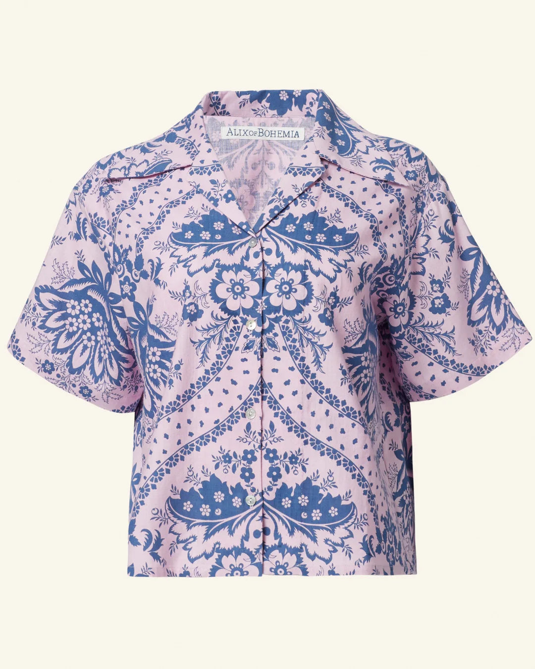 Alix of Bohemia Stevie Oasis cotton top with a button front, short sleeves in a Pink and Blue print.