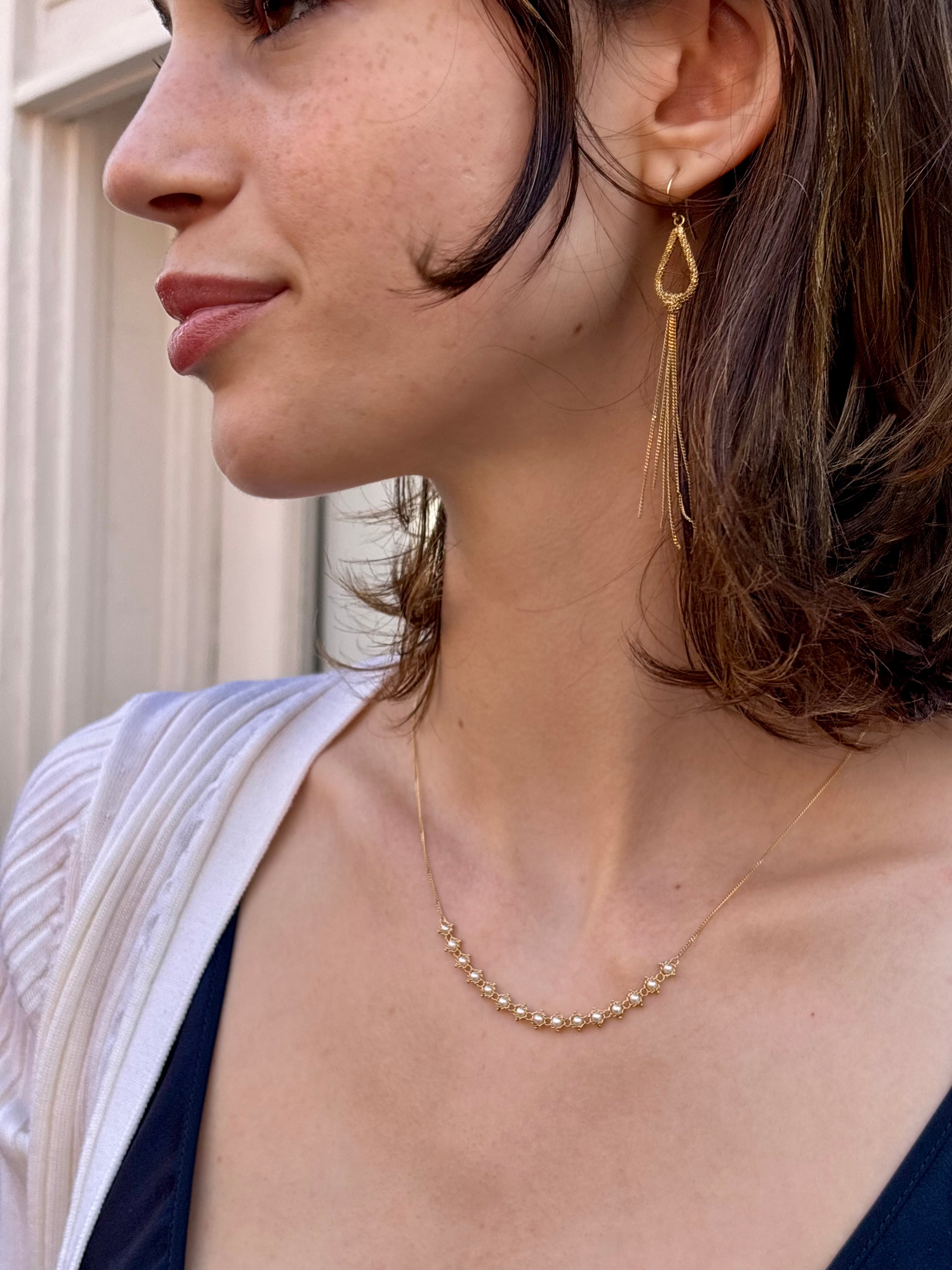 Woman wearing luxury designer Amali freshwater Pearl and 18k yellow gold Necklace fine jewelry handmade in USA 