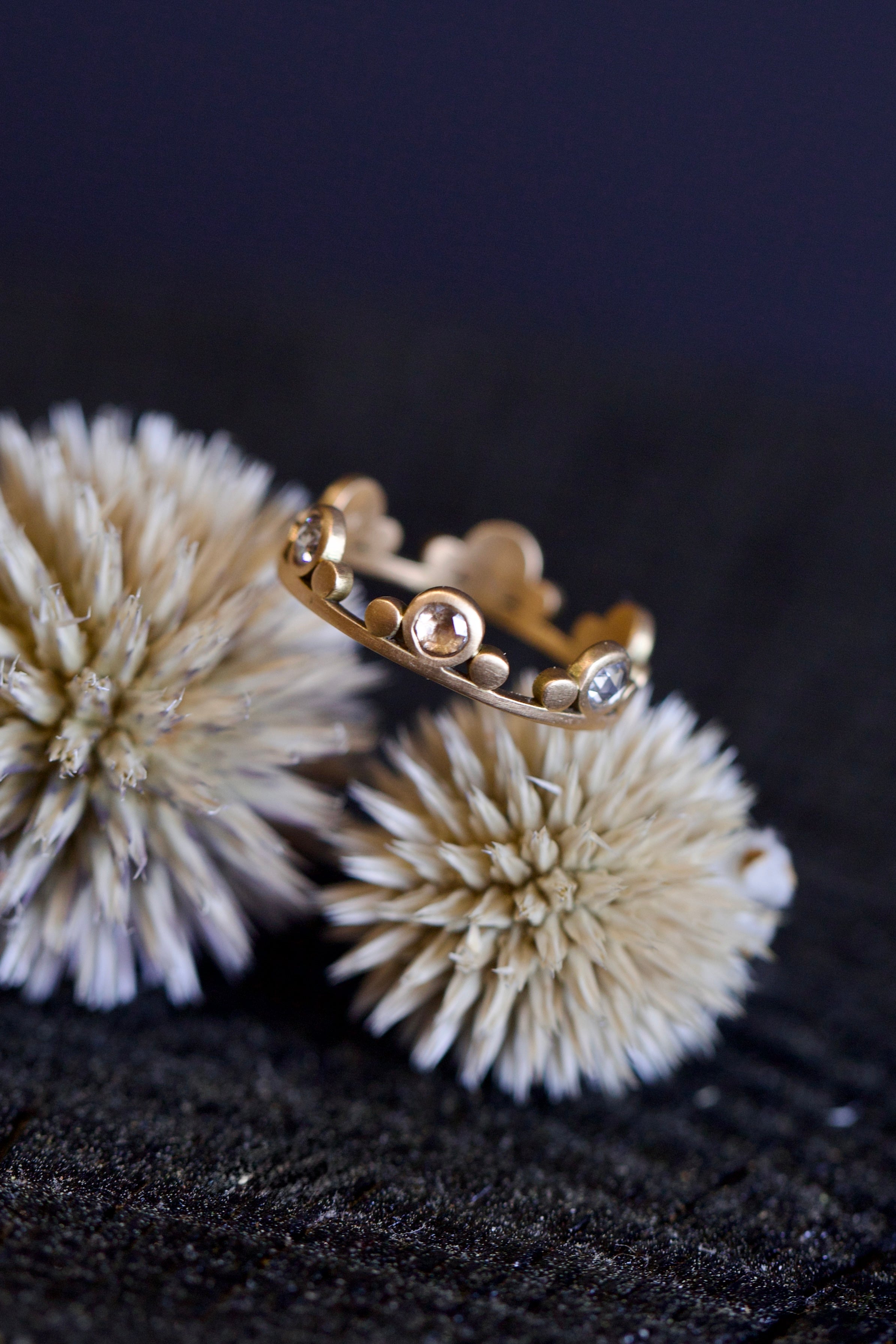 Image featuring fine jeweler Ananda Khalsa Large White Diamond 18k hammered matte Gold Side Trios Ring in premium handcrafted construction 