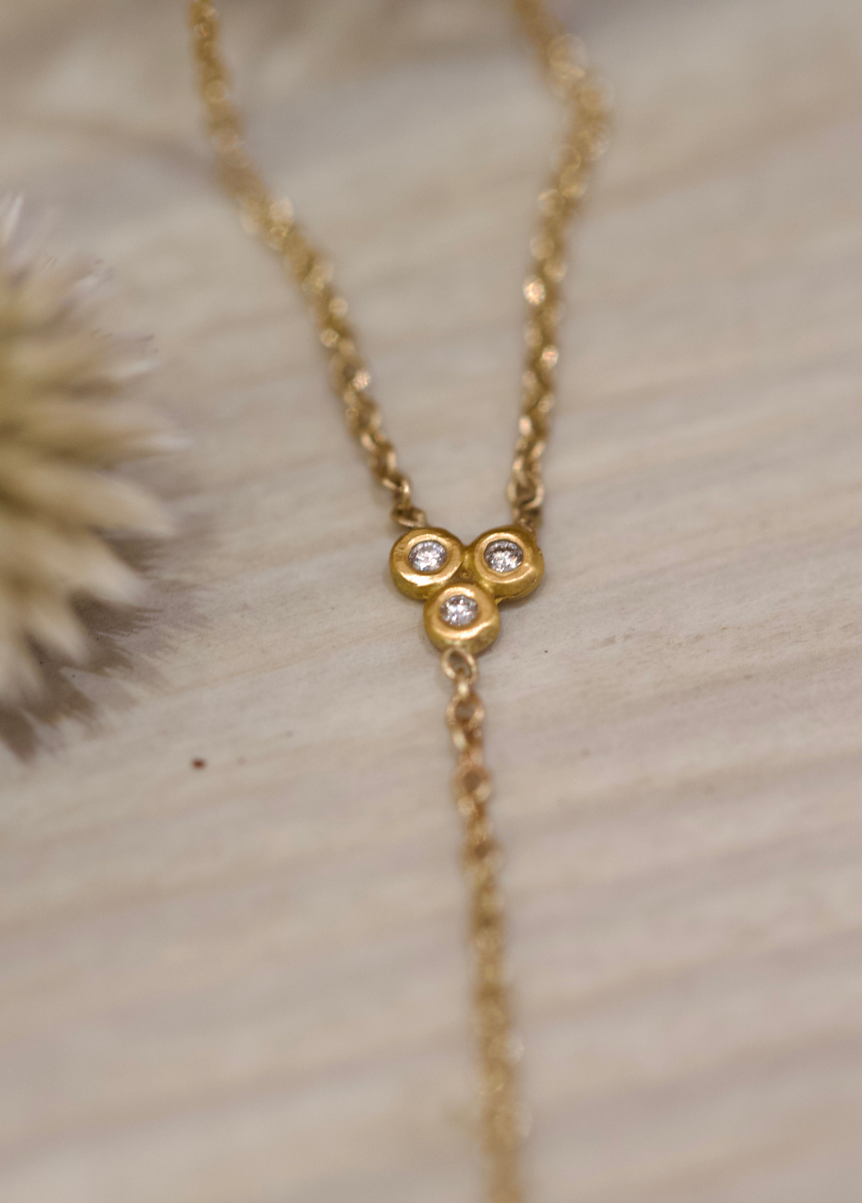 Image of Ananda Khalsa Delicate Diamond Trio Necklace  featuring white diamonds 22kt yellow gold bezel with 22kt diamond drop on an 14kt gold chain