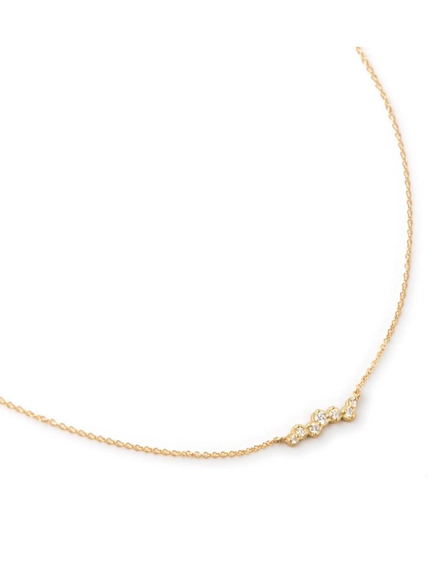 Image featuring artist Anne Sportun Cascade Diamond Necklace with uneven row of diamonds and fabricated in 18k yellow gold