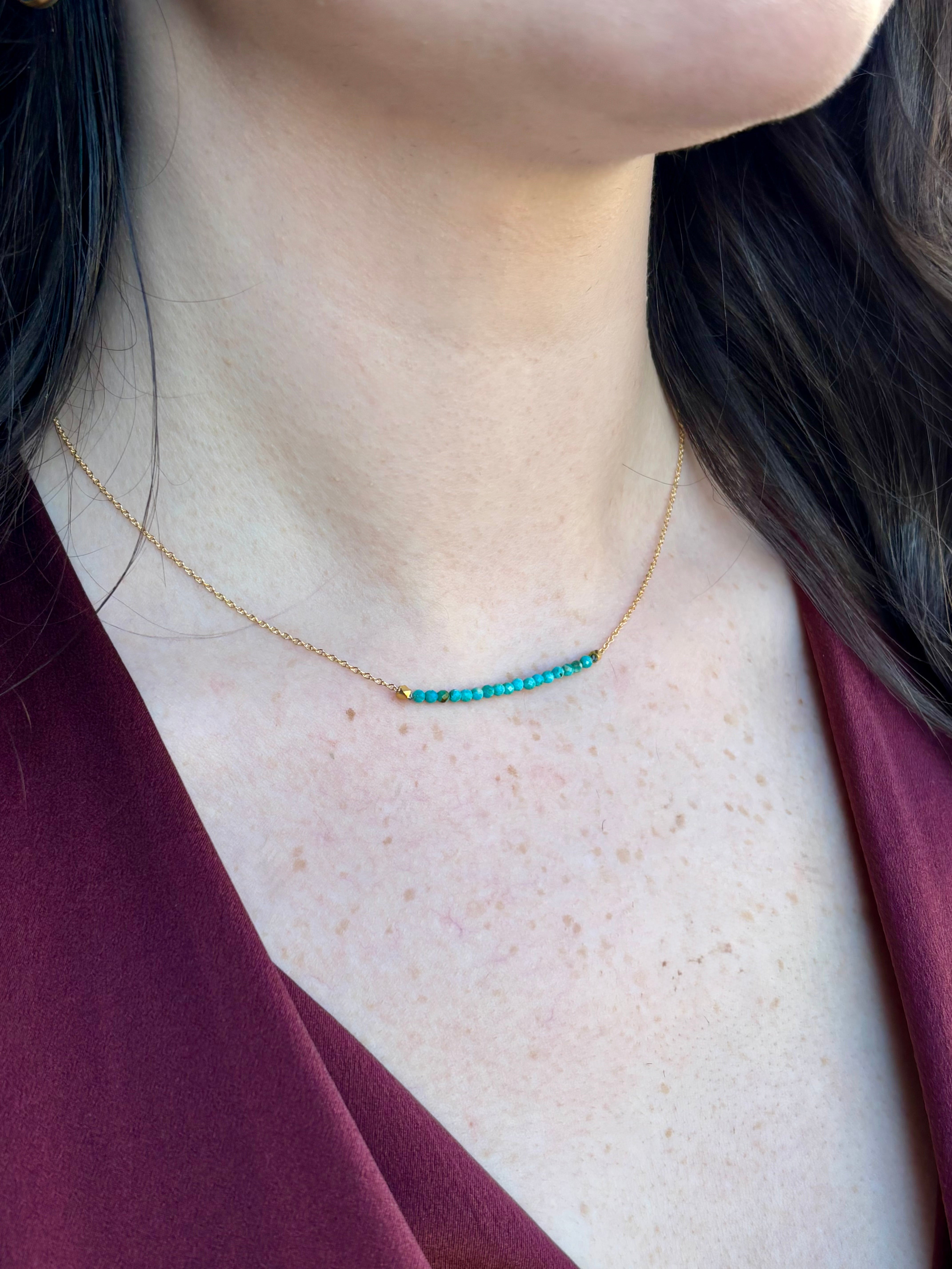 Image of woman wearing fine jewelry designer ANNE SPORTUN Centre Turquoise and 18k yellow gold Wrap Necklace 
