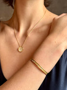 18k yellow gold diamond cuff by fine jewelry artist Anne Sportun with 31 round brilliant cut G/VS diamonds 