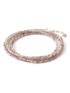 Image featuring a handmade mink moonstone wrap bracelet by Anne Sportun that can be worn as a bracelet or necklace with 18k yellow gold.