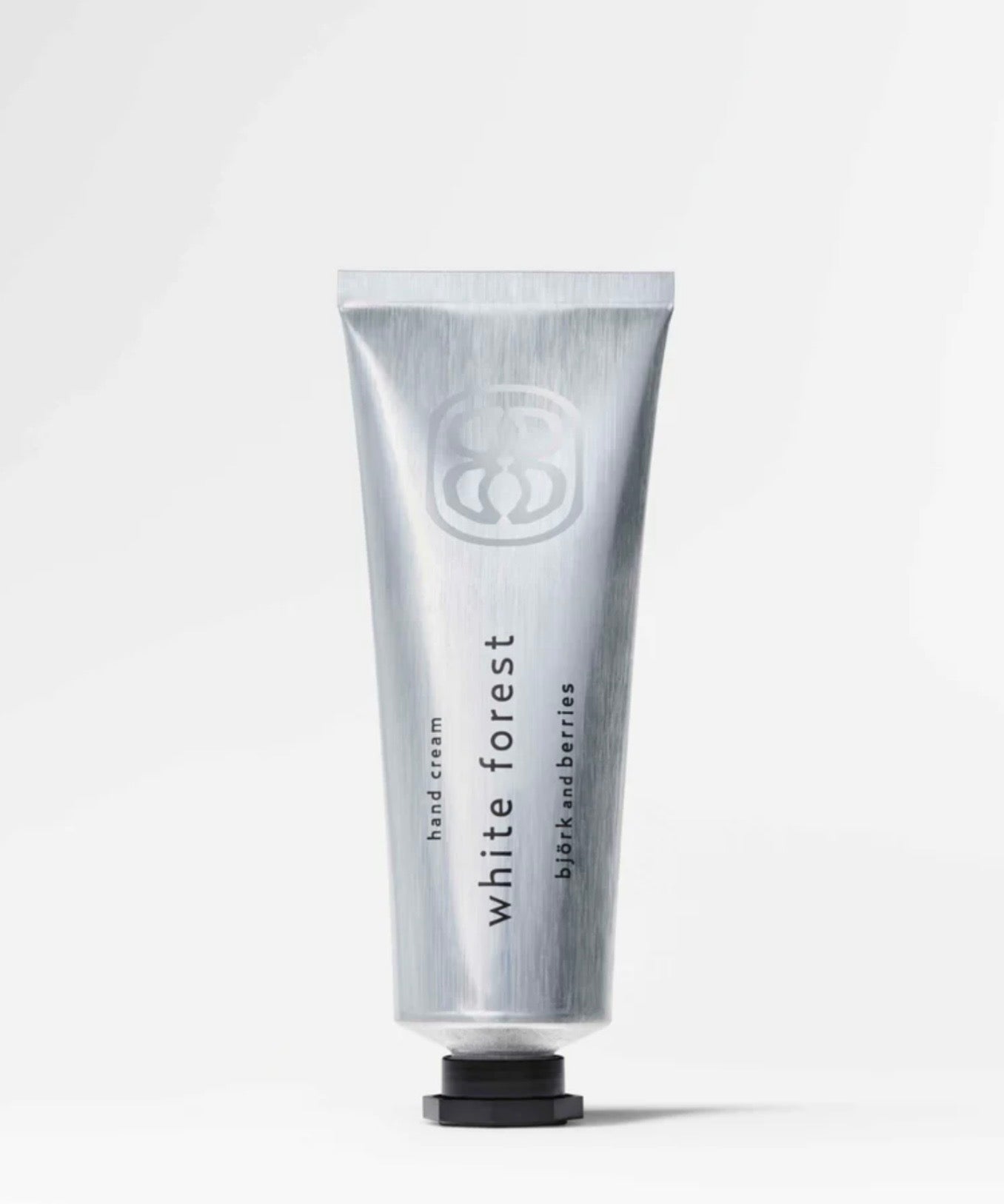 Image of BJORK AND BERRIES White Forest luxury personal fragrance hand cream with notes of Bergamot, Tonka Bean and Vetiver in an aluminum tube