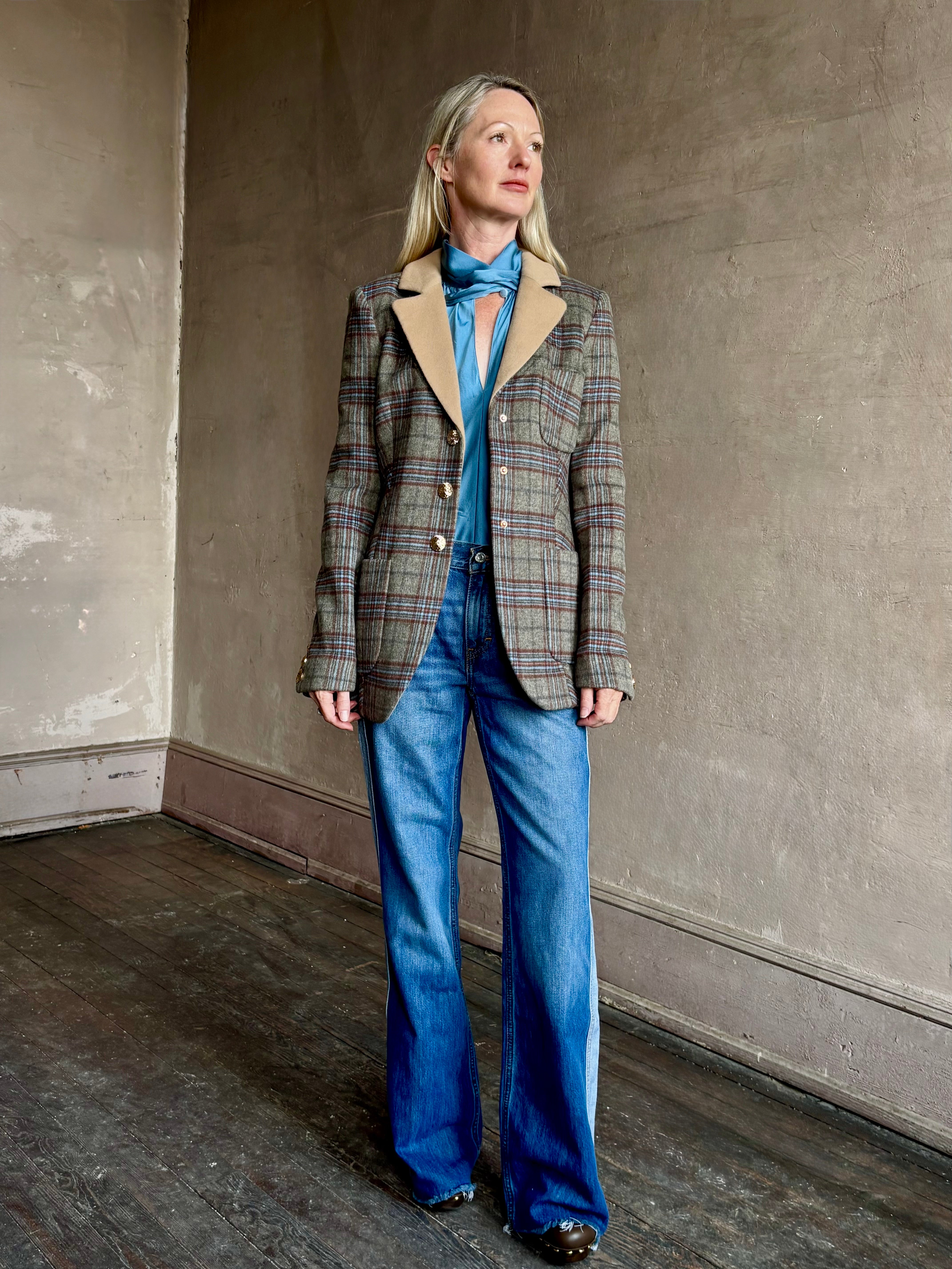 Image of woman wearing the Cara Cara Ross classic tailored Ross blazer with 3 buttons, front pockets, and contrasting lapel