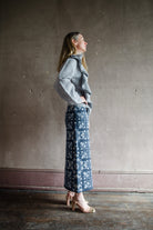 Image featuring a woman wearing the cashmere and cotton skirt by Cara Cara with a high rise and a-line fit in a beautiful knit texture in Blue Rita colorway.