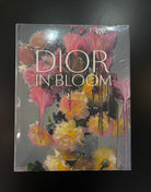 Dior in Bloom: a large-format hardcover tracing eight decades of floral inspiration at the House of Dior. Archival sketches, embroidery details, and Nick Knight rose portraits.