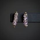 Image of sterling silver and amethyst Tlinear Stud Earrings from fine jewelry artist Erica Bailey hand crafted in USA