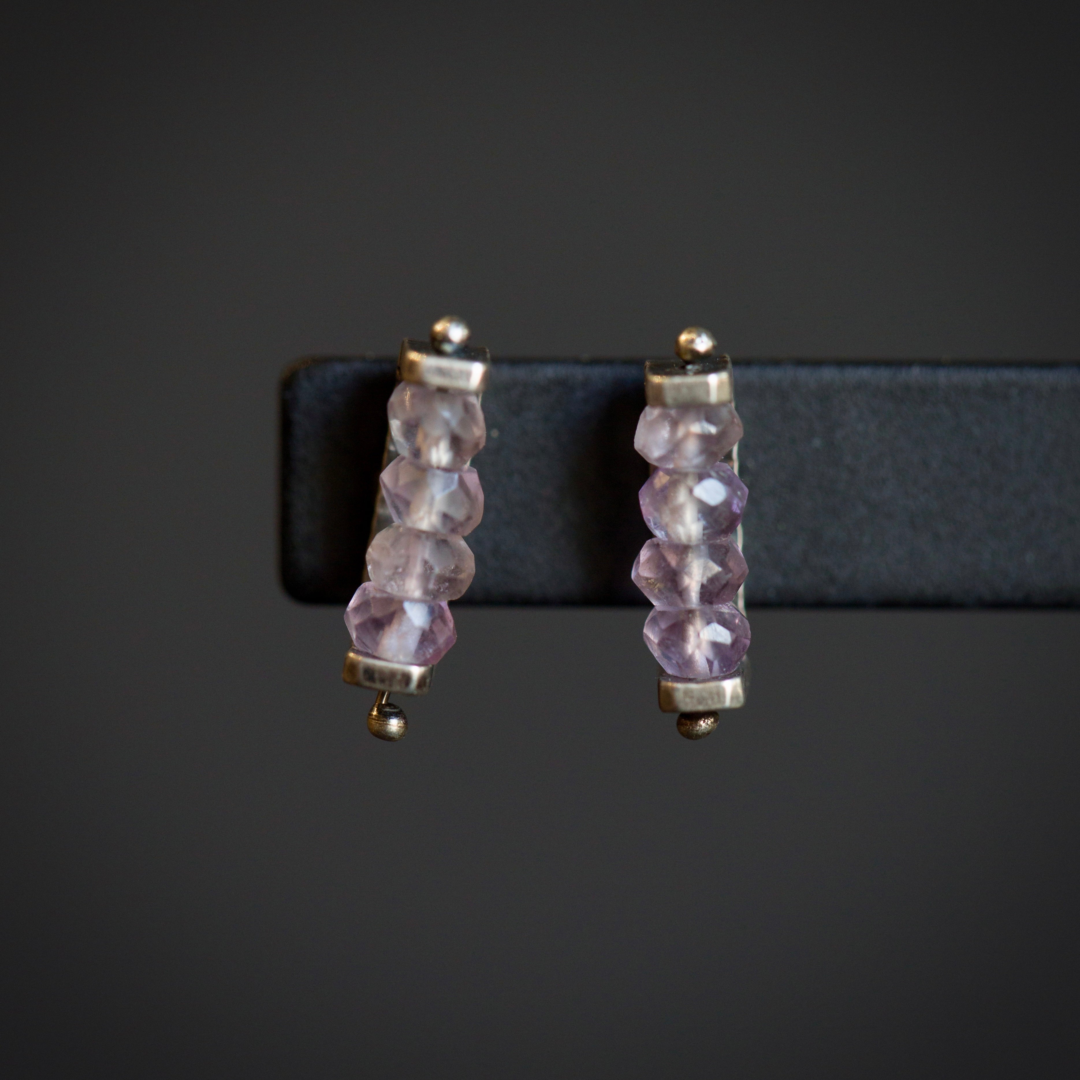 Image of sterling silver and amethyst Tlinear Stud Earrings from fine jewelry artist Erica Bailey hand crafted in USA