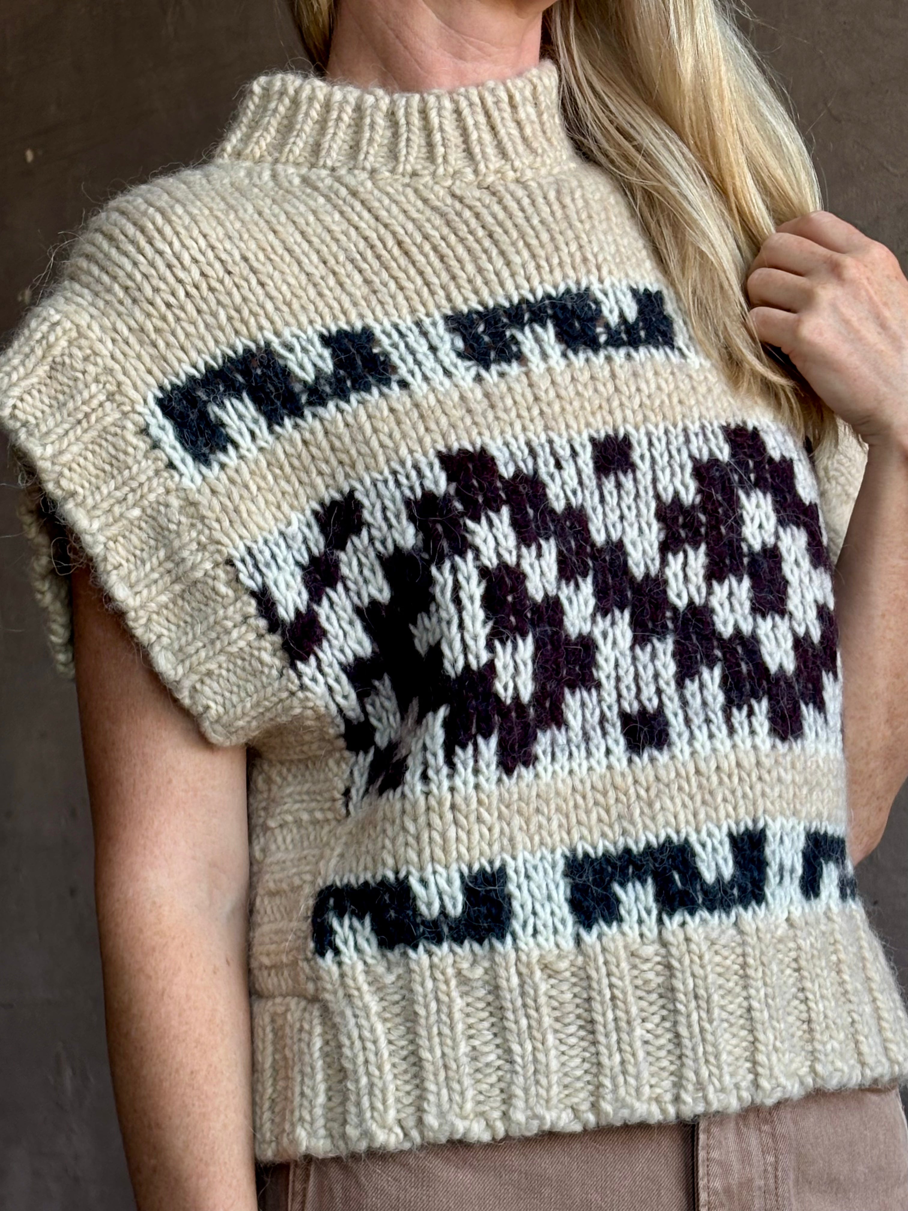 Image of mature woman wearing luxury Italian designer FORTE FORTE Attica Jacquard alpaca wool knit sweater Vest in Honey