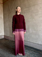 Image of mature woman wearing luxury Italian designer FORTE FORTE Round Neck long sleeve Sweater in Ruby red with Premium Italian Mohair 