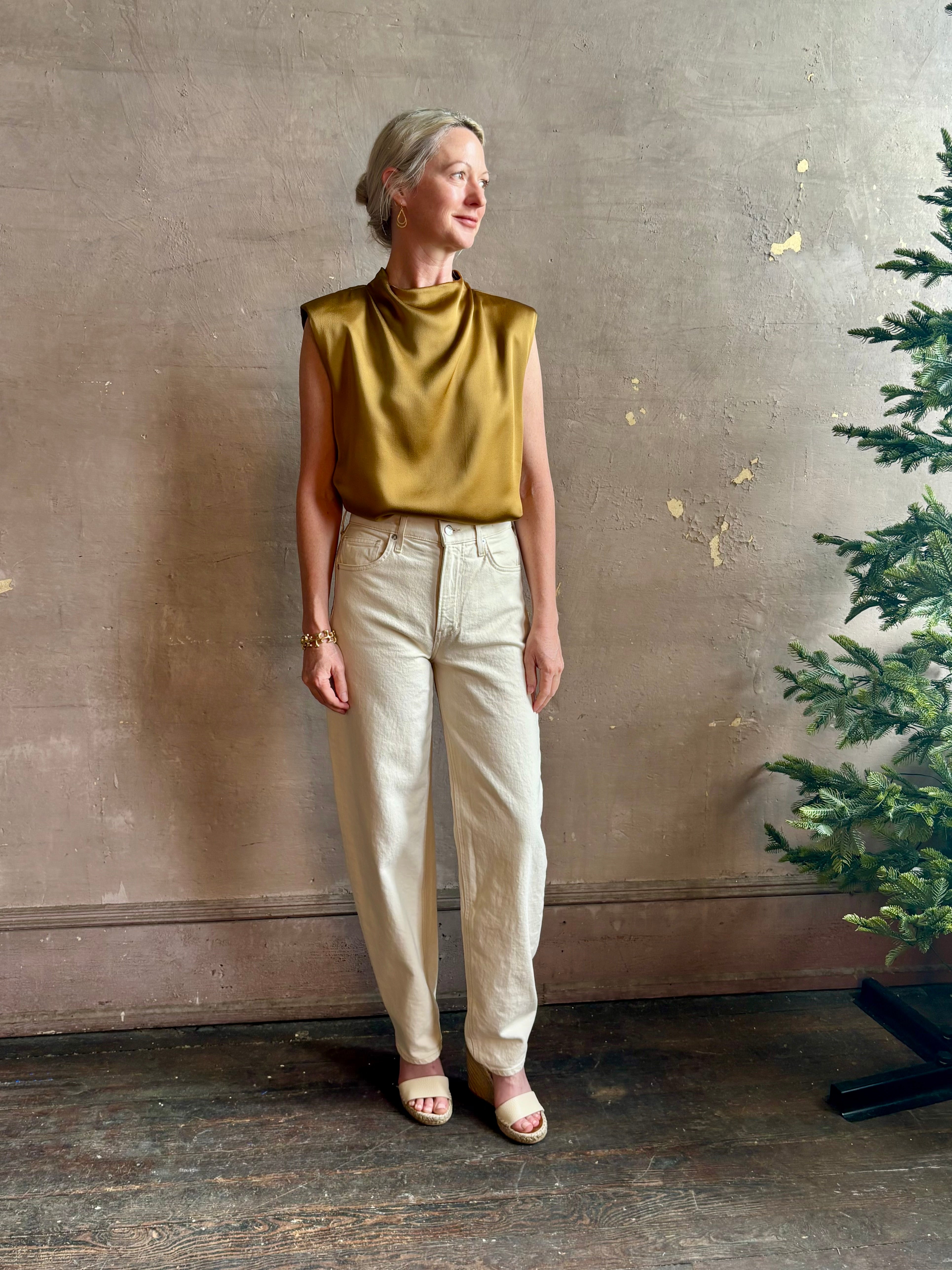 woman wearing luxury Italian designer FORTE FORTE Envers Satin Crater-Neck sleeveless Shirt matte Antique Gold 