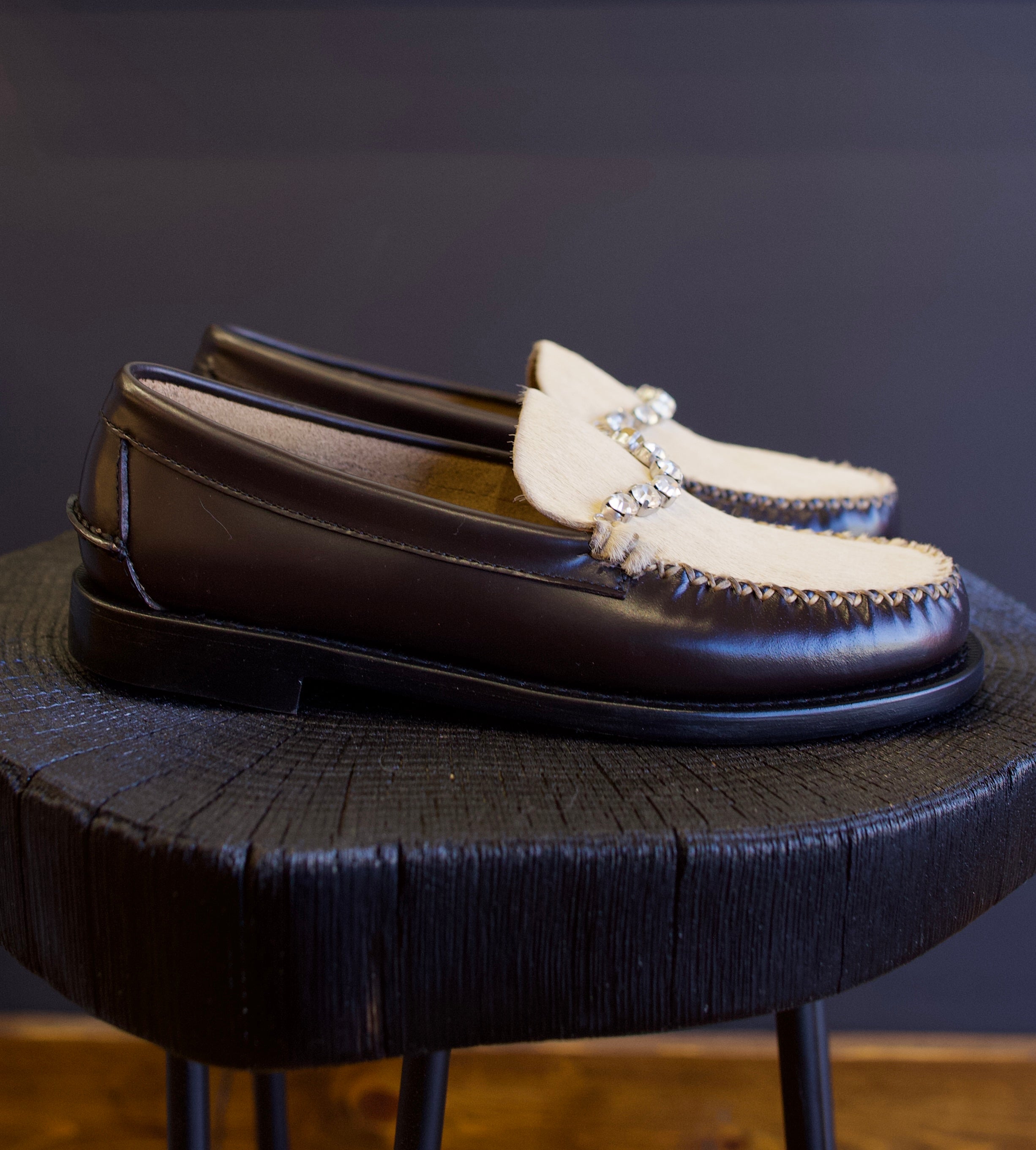 Image featuring the Forte Forte collaboration loafers with Sebago. They are brown leather with ivory horsehair accents and rhinestone detailing.