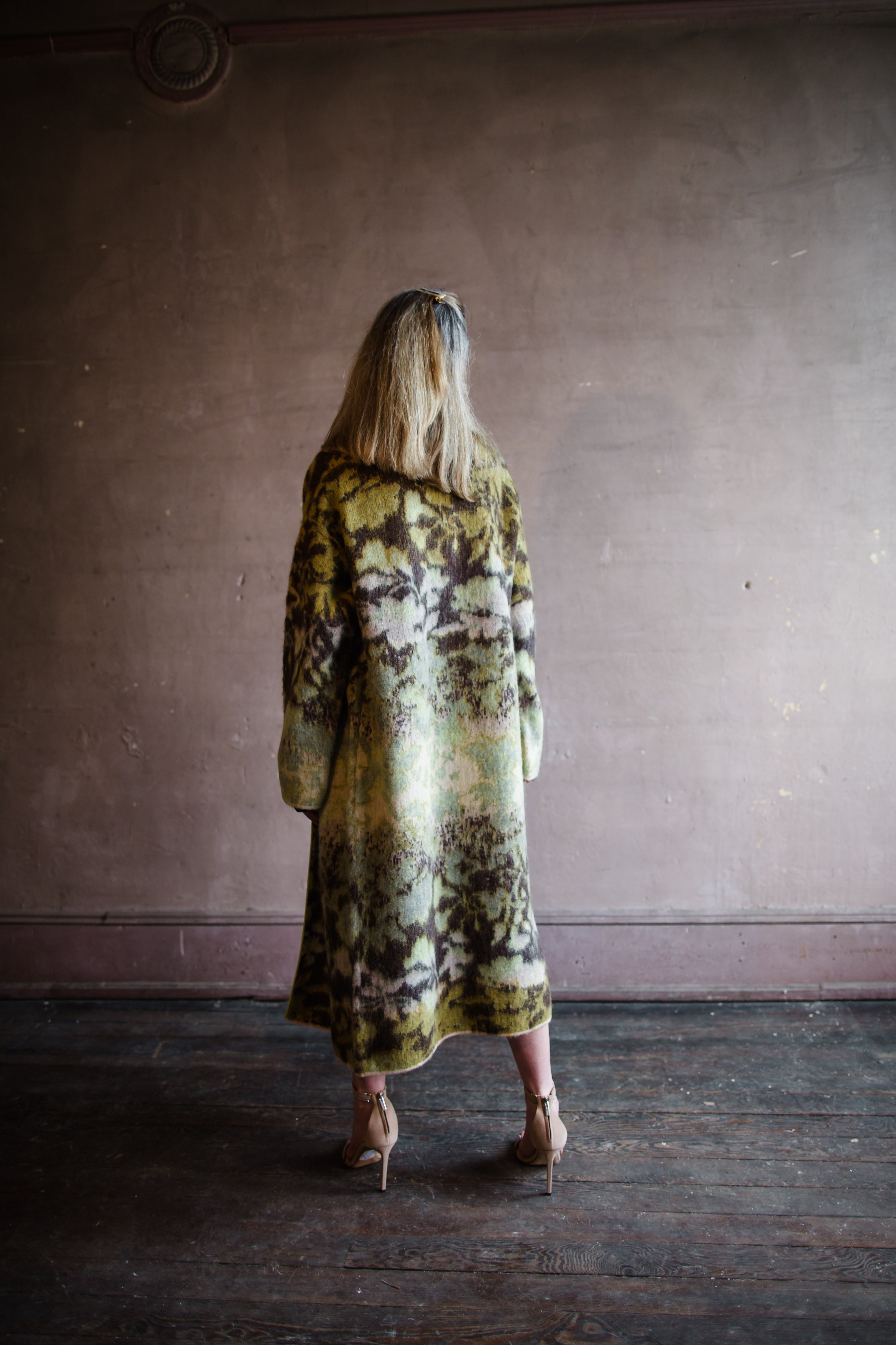 Image of a woman wearing the bloom mist cardigan duster sweater by Forte Forte with an open front and with a ribbon trim fabricated in mohair and alpaca.