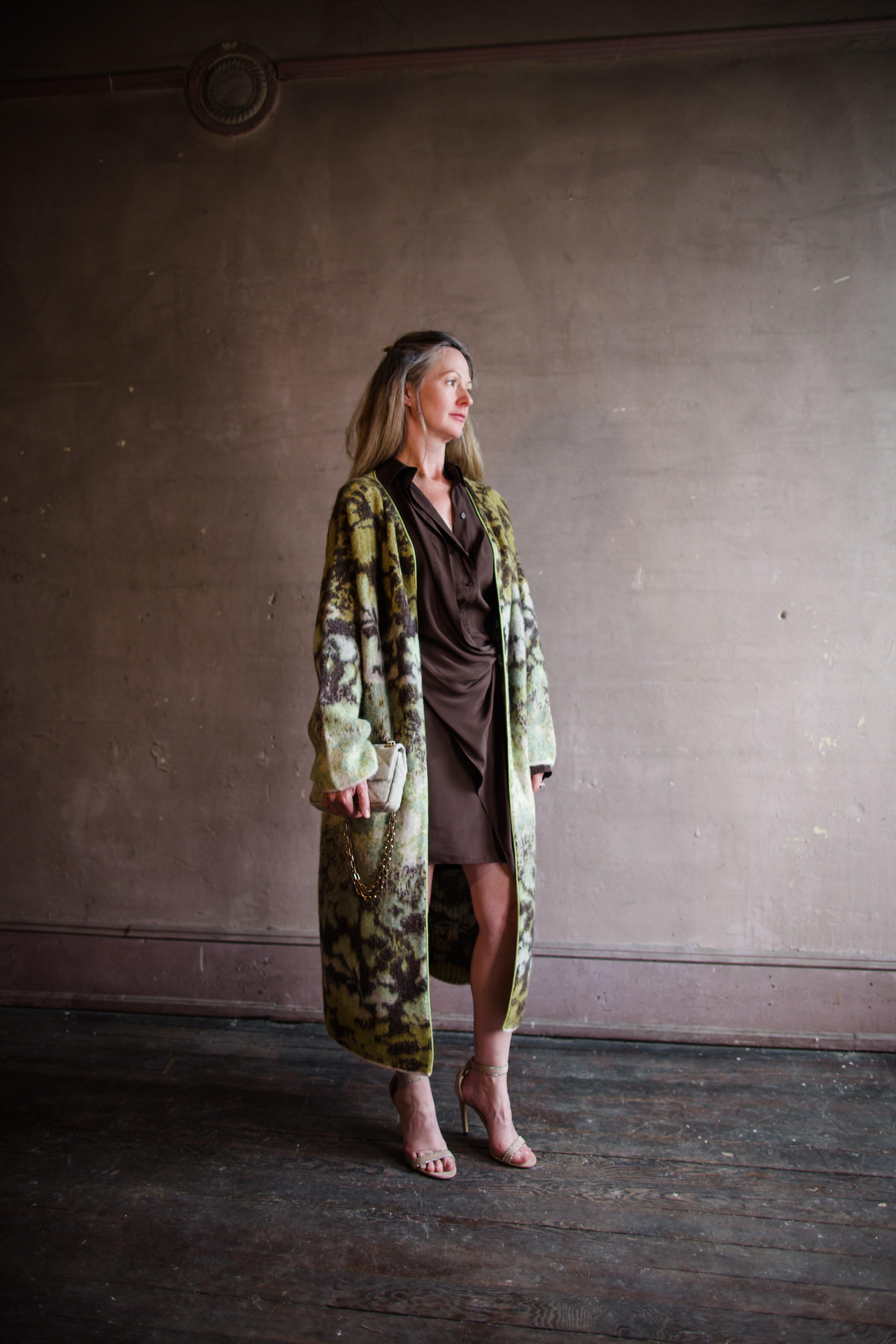 Image of a woman wearing the bloom mist cardigan duster sweater by Forte Forte with an open front and with a ribbon trim fabricated in mohair and alpaca.