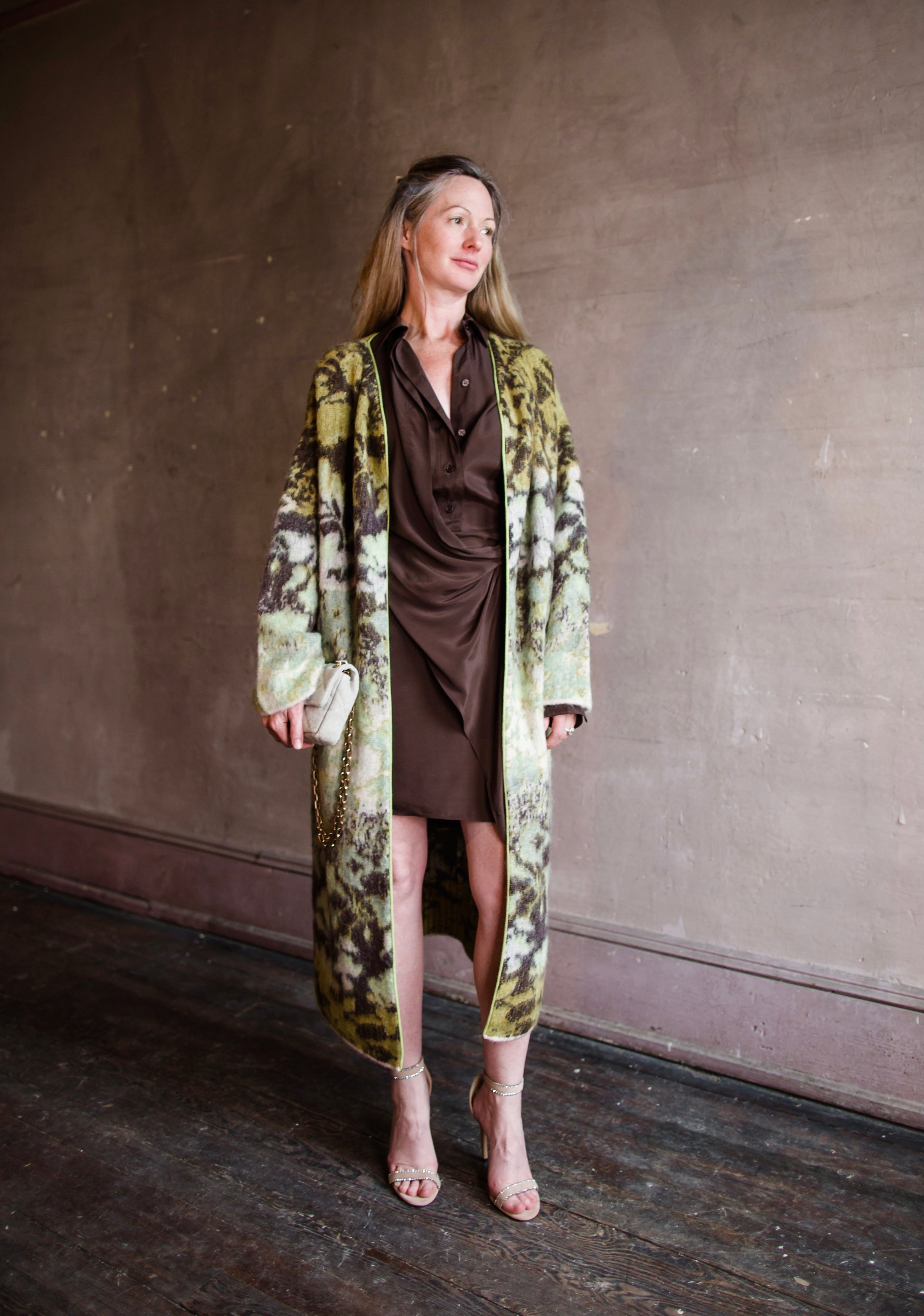 Image of a woman wearing the bloom mist cardigan duster sweater by Forte Forte with an open front and with a ribbon trim fabricated in mohair and alpaca.