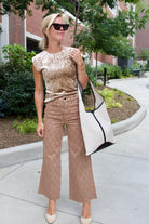 Model wearing velvet top from Italian designer Forte_Forte paired with Veronica Beard denim, a chic Soeur tote and Vibi Venezia velvet espadrilles