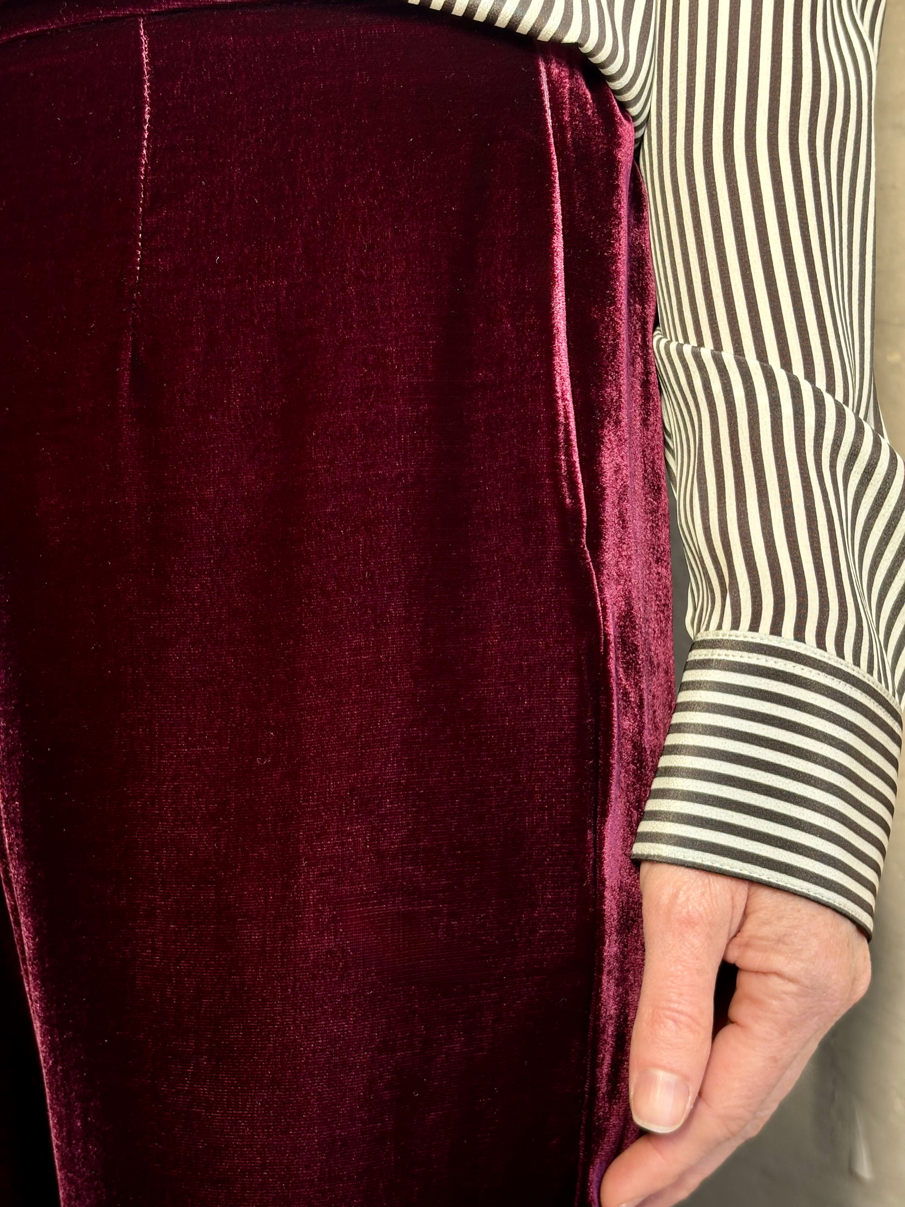 Close up of Forte_Forte Plain Velvet Flare Pants in Burgundy with tailored fitted waistband and a slim flattering flat front