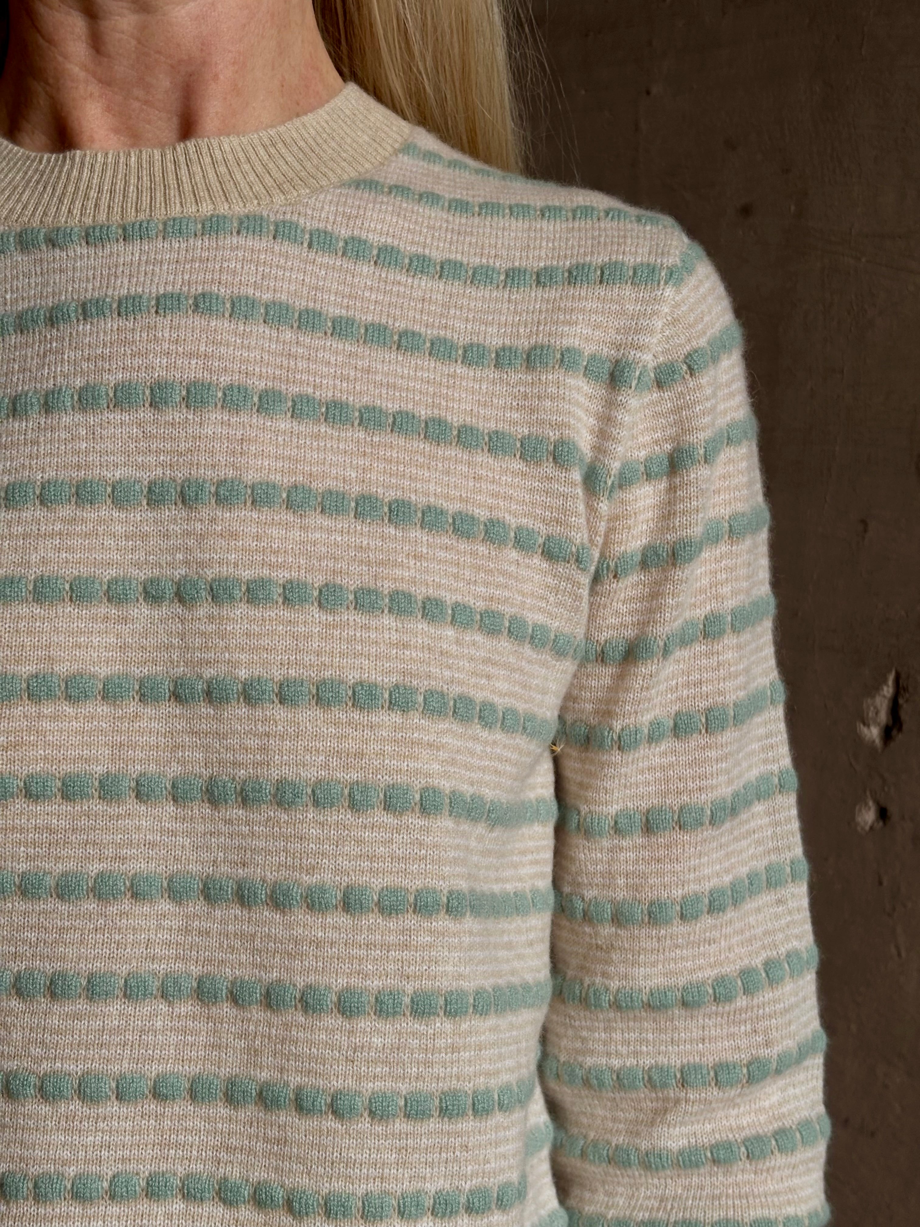 Mature woman wearing Guest in Residence Pebble sandstone dot stripe shrunken crew long sleeve cashmere 