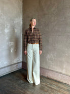 mature woman wearing luxury American clothing designer Guest in Residence plaid Button-Down Long Sleeve Collared Dylan cashmere shirt