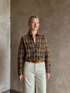 mature woman wearing luxury American clothing designer Guest in Residence plaid Button-Down Long Sleeve Collared Dylan cashmere shirt