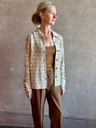 Image of woman wearing luxury designer GUEST IN RESIDENCE Dylan Tweed Shirt in Sandstone Combo in neutral tweed print