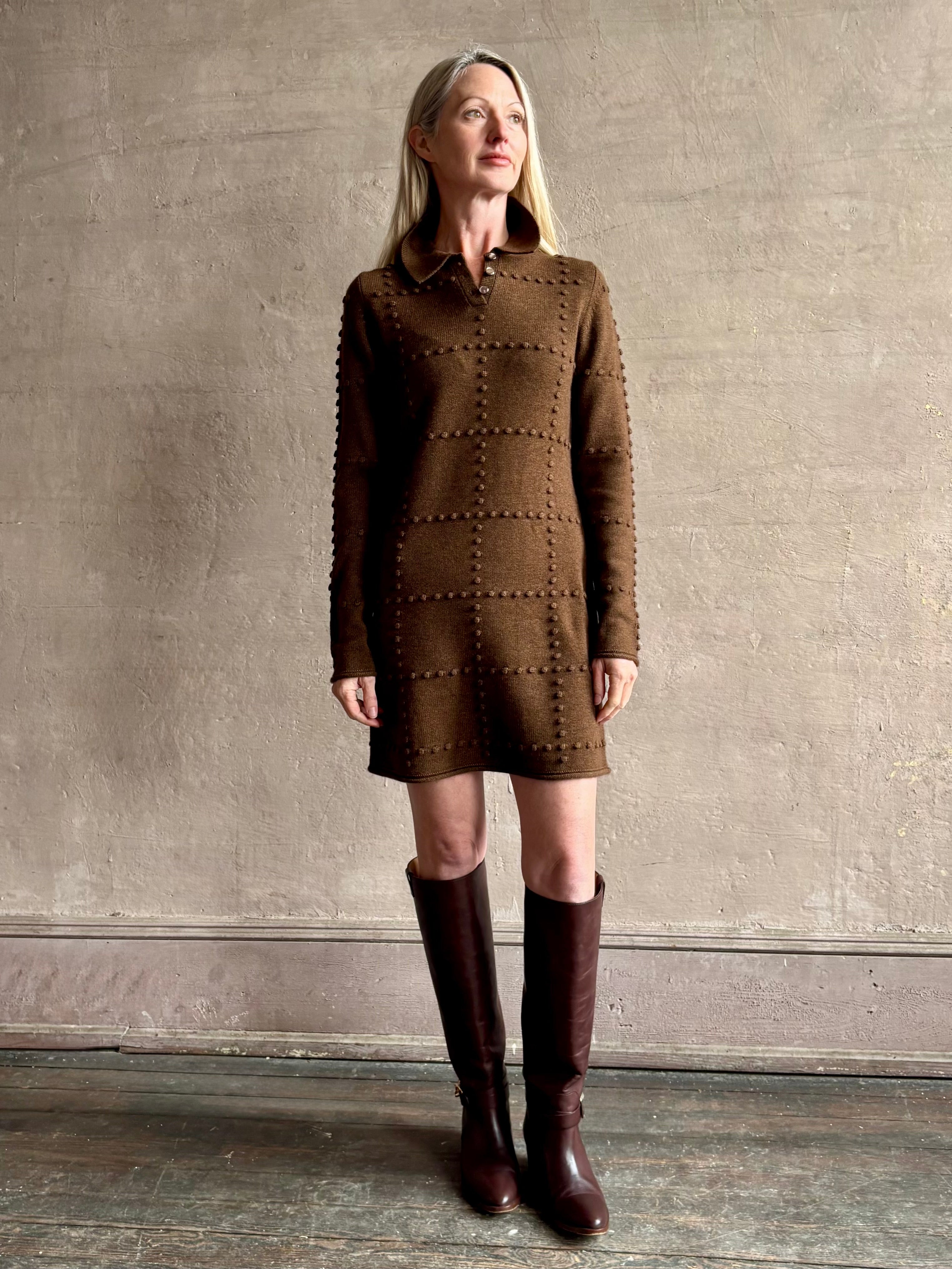 Image of mature woman wearing celebrity brand Guest in Residence Popcorn Polo long sleeve mini dress with a geometric patterned texture