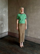 Mature woman wearing Guest in Residence Rib Ringer Tee Cashmere Sweater in Highland/Fig vintage-inspired 