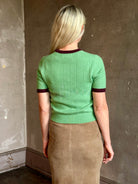Mature woman wearing Guest in Residence Rib Ringer Tee Cashmere Sweater in Highland/Fig vintage-inspired 