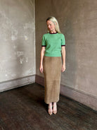 Mature woman wearing Guest in Residence Rib Ringer Tee Cashmere Sweater in Highland/Fig vintage-inspired 