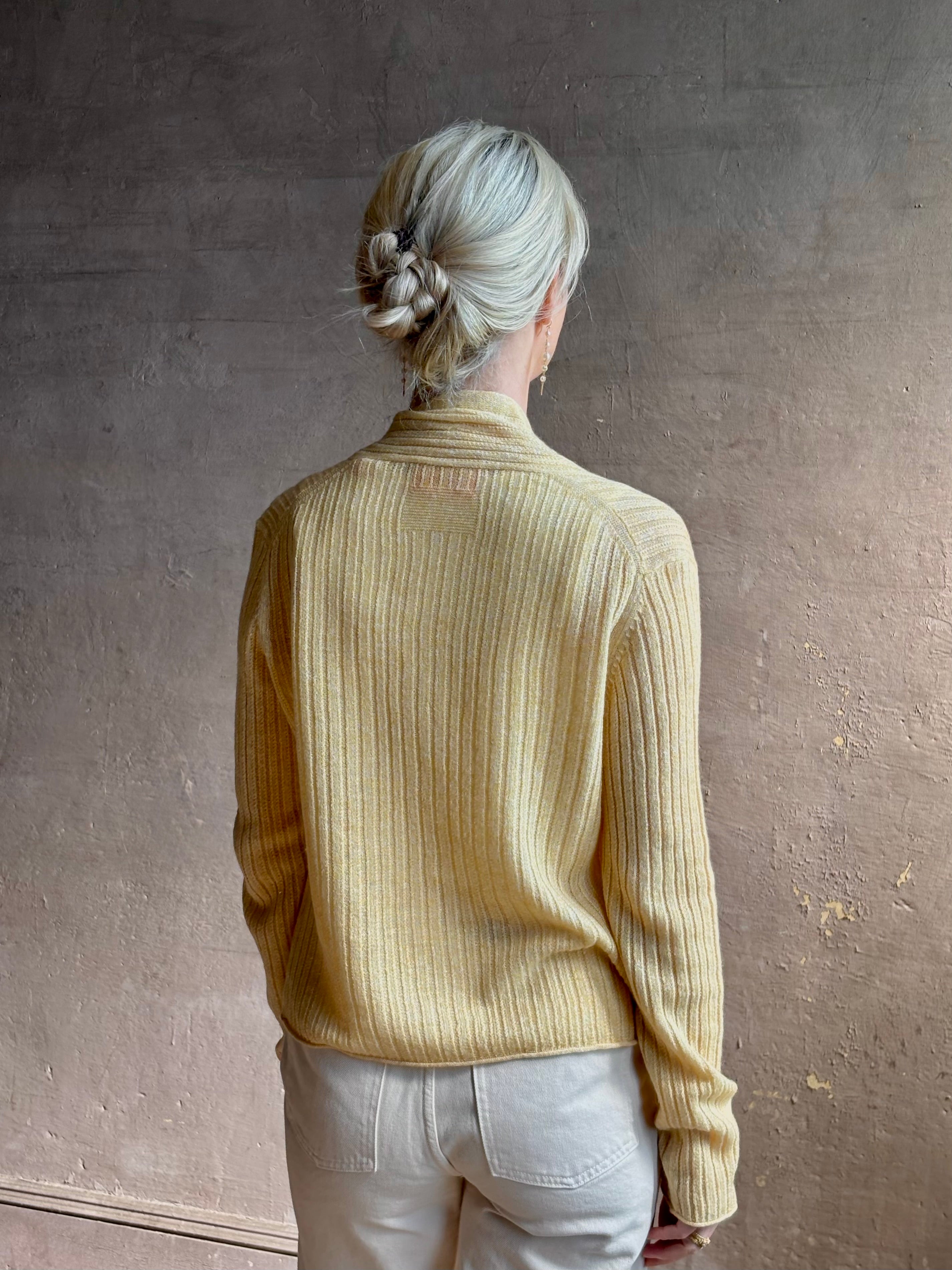 Mature woman wearing Guest in Residence Rib Stealth Cardigan layering essential in butter yellow cashmere linen blend