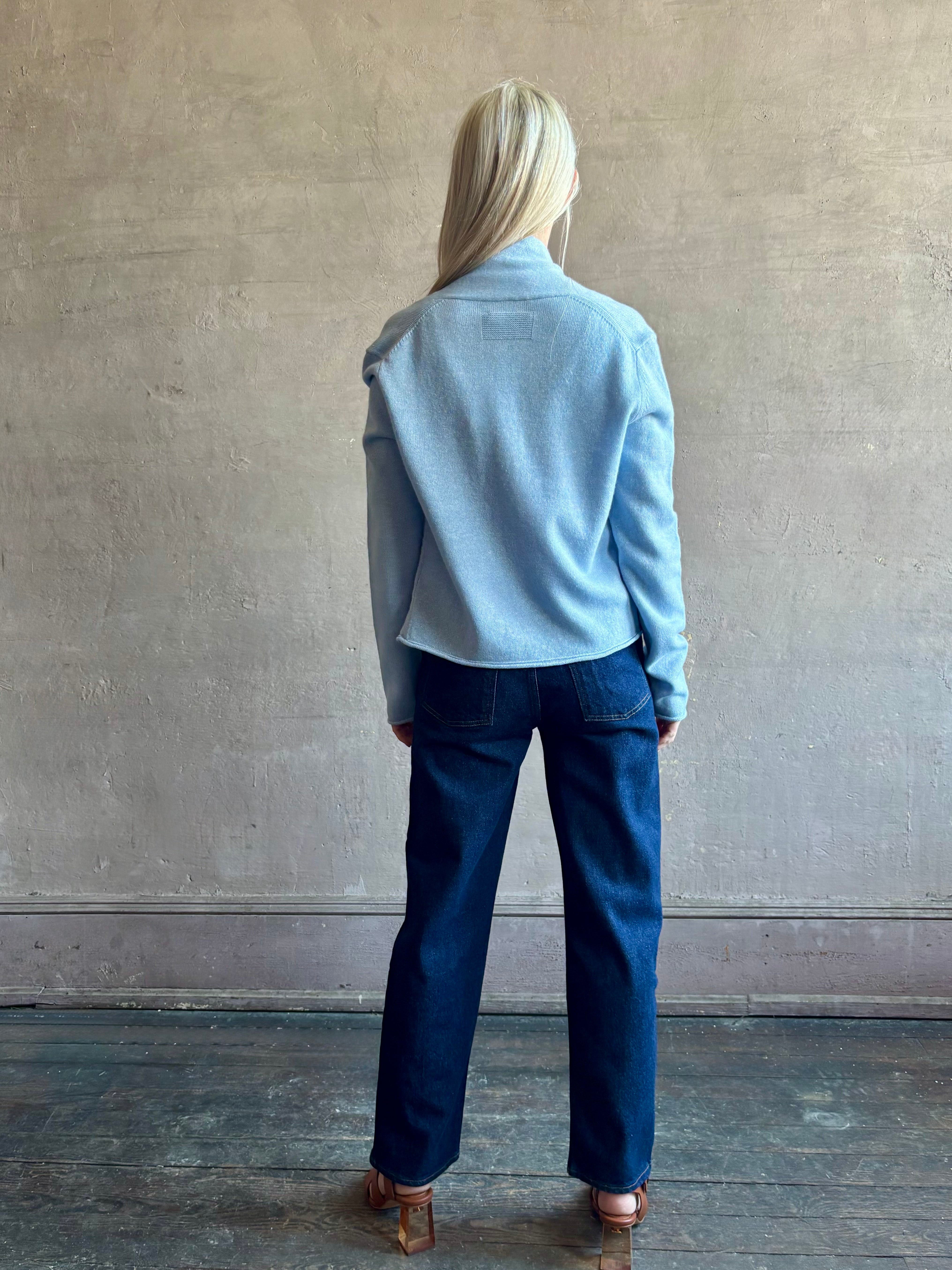 Image of woman wearing comfortable Clear Sky blue Guest in Residence Stealth cashmere linen lightweight Cardigan with long sleeves and open front with single hook and eye closure