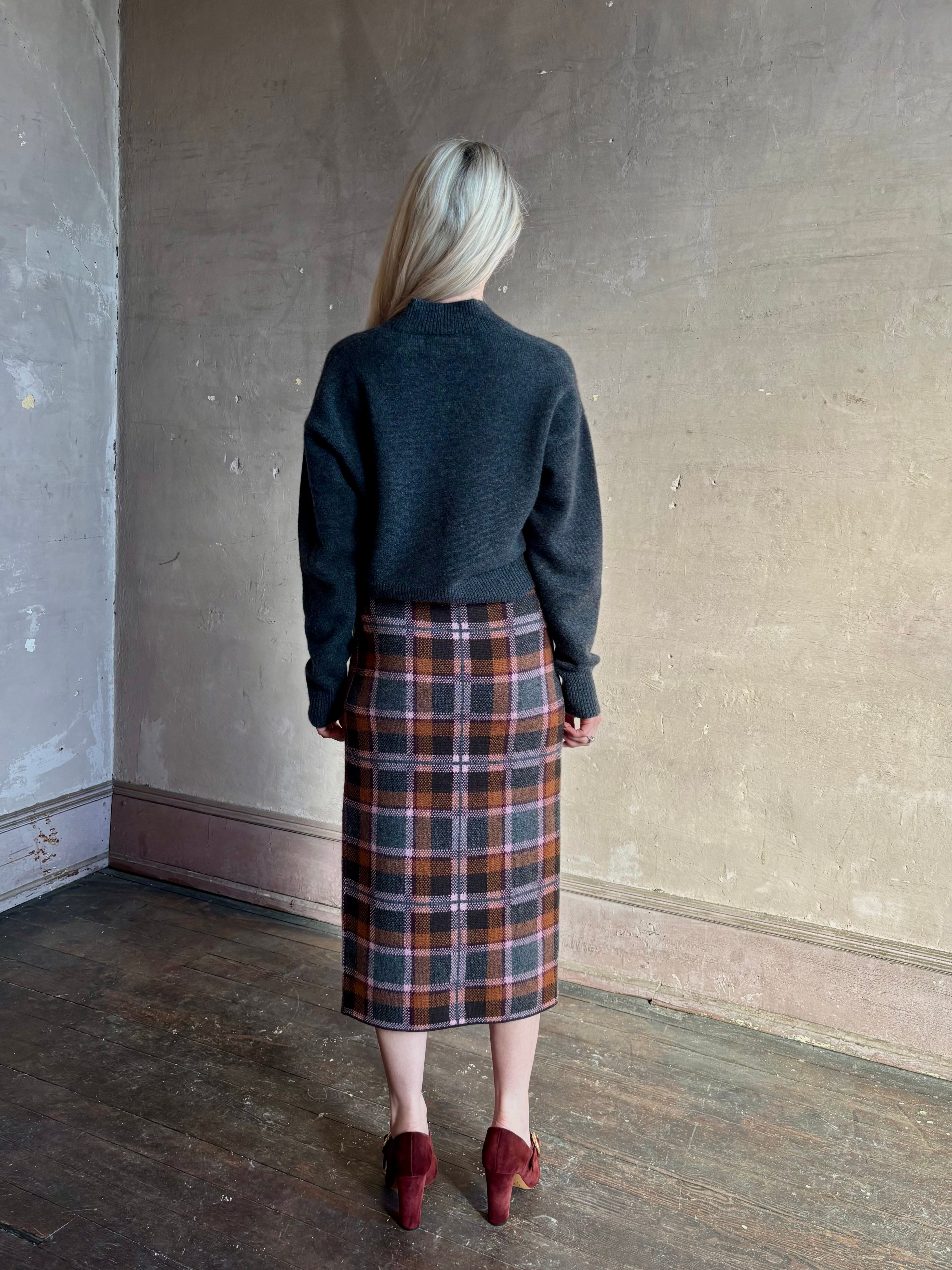 Mature woman wearing Guest in Residence Tartan Wrap Skirt in Sprinkle Combo wool-cashmere midi pencil silhouette and fringe trim